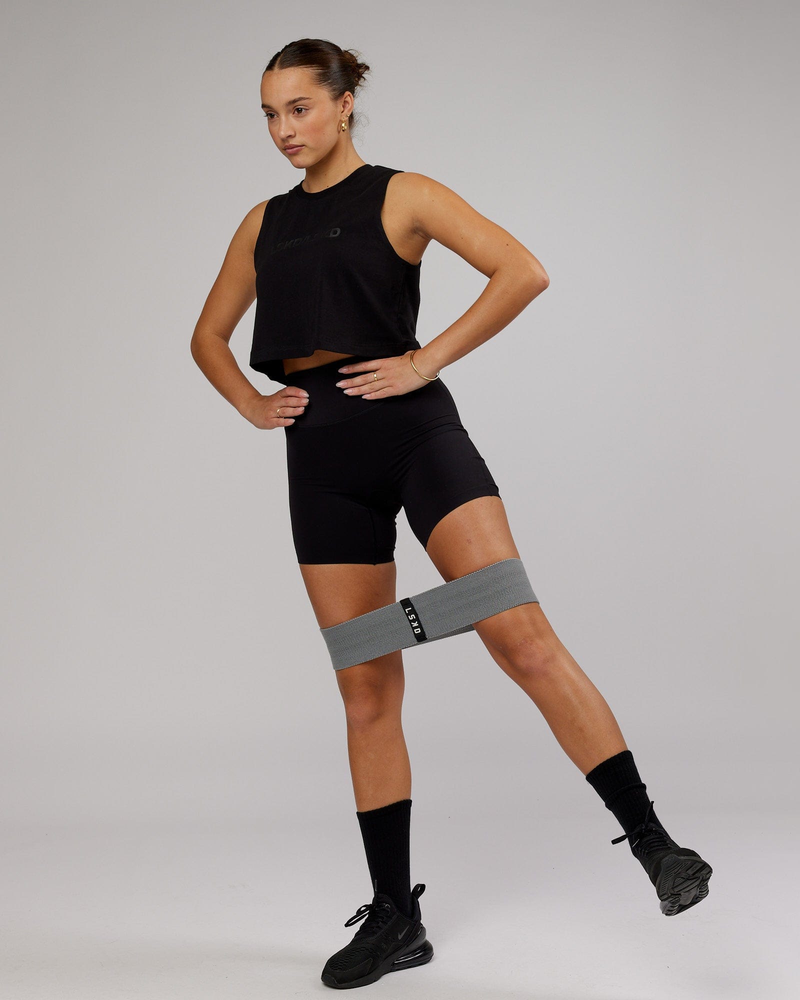 Model wearing Speedway FLXCotton Cropped Tank - Black