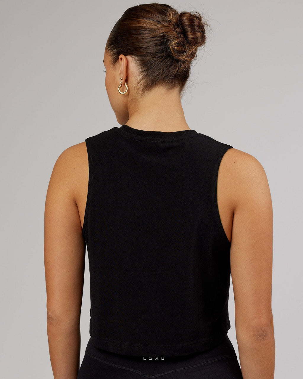 Model wearing Speedway FLXCotton Cropped Tank - Black