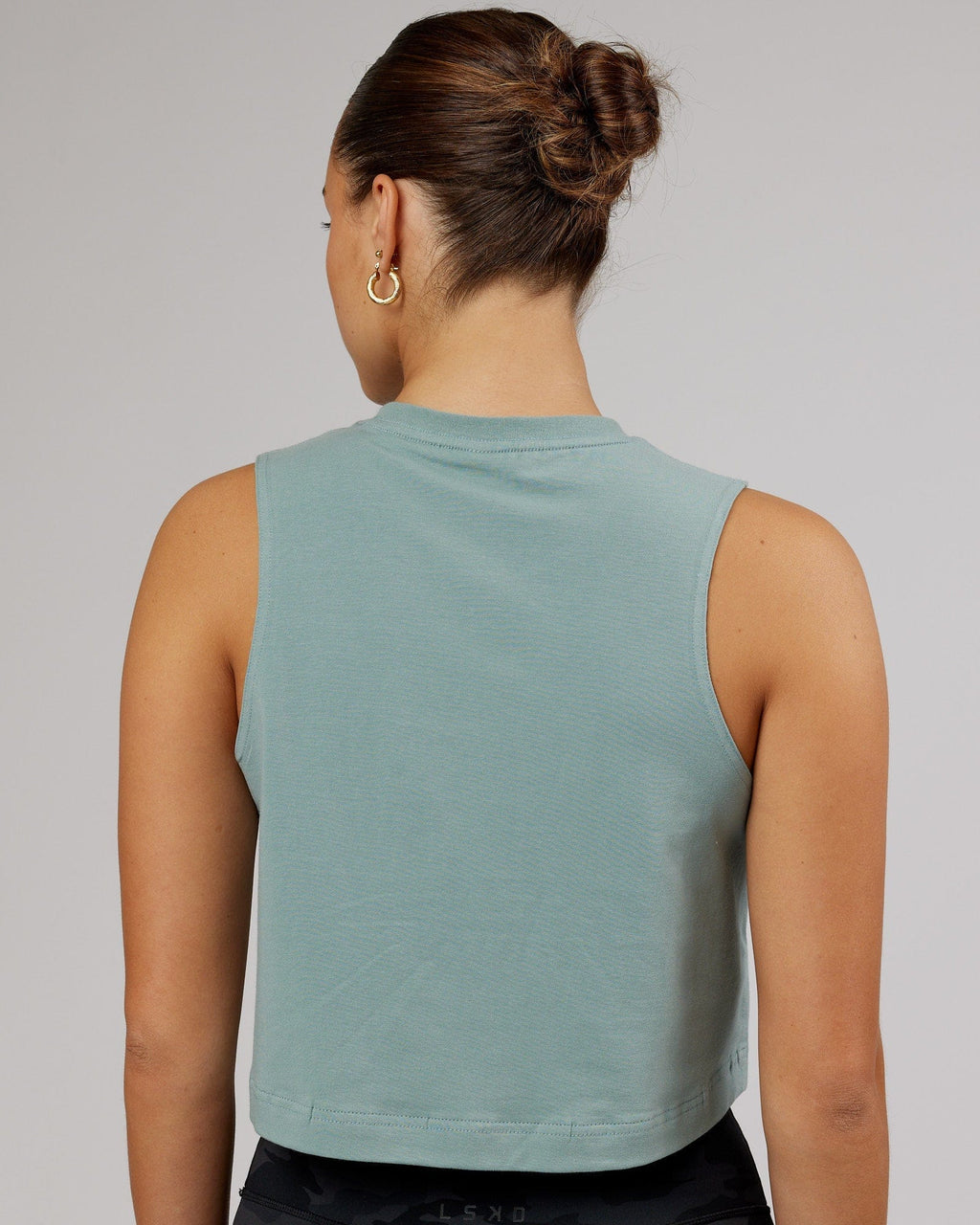 Model wearing Speedway FLXCotton Cropped Tank - Frost