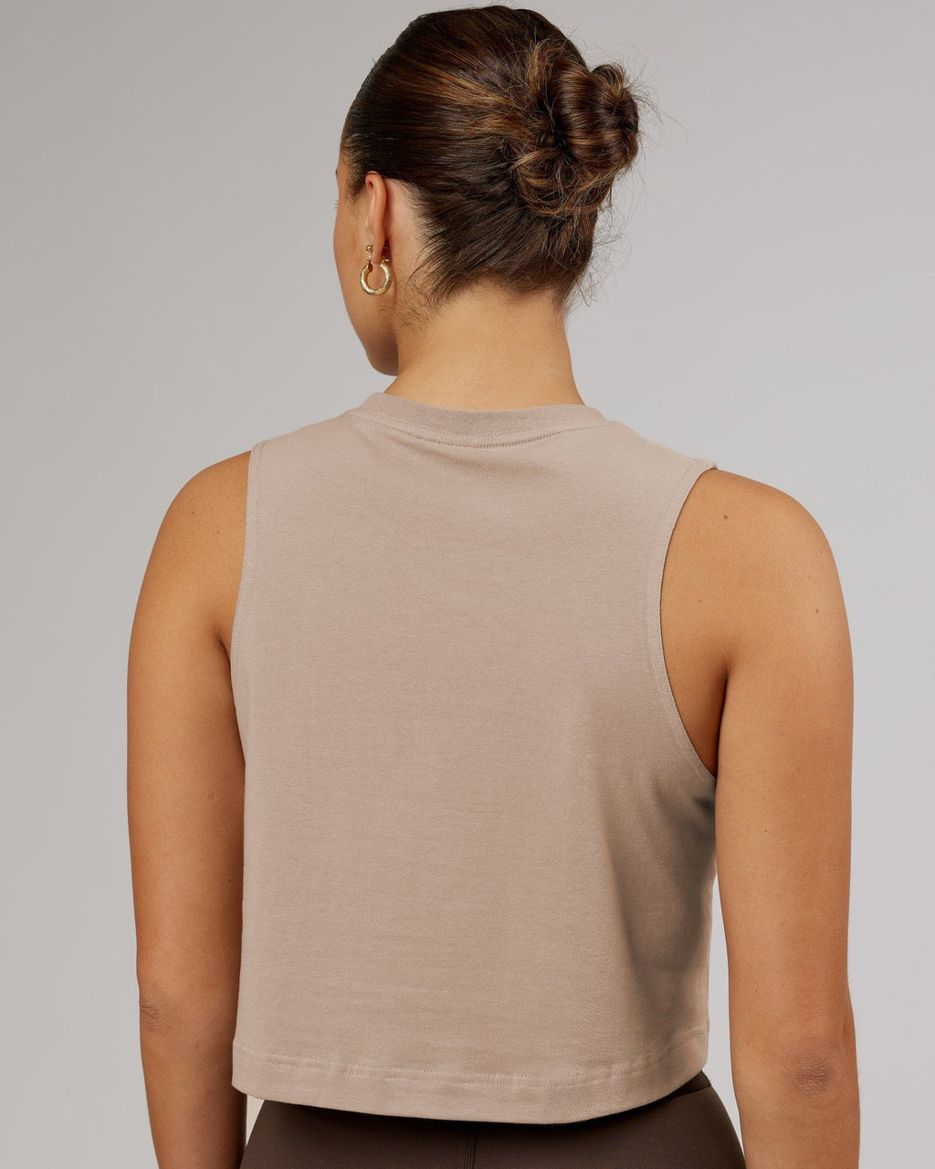 Model wearing Speedway FLXCotton Cropped Tank - Taupe