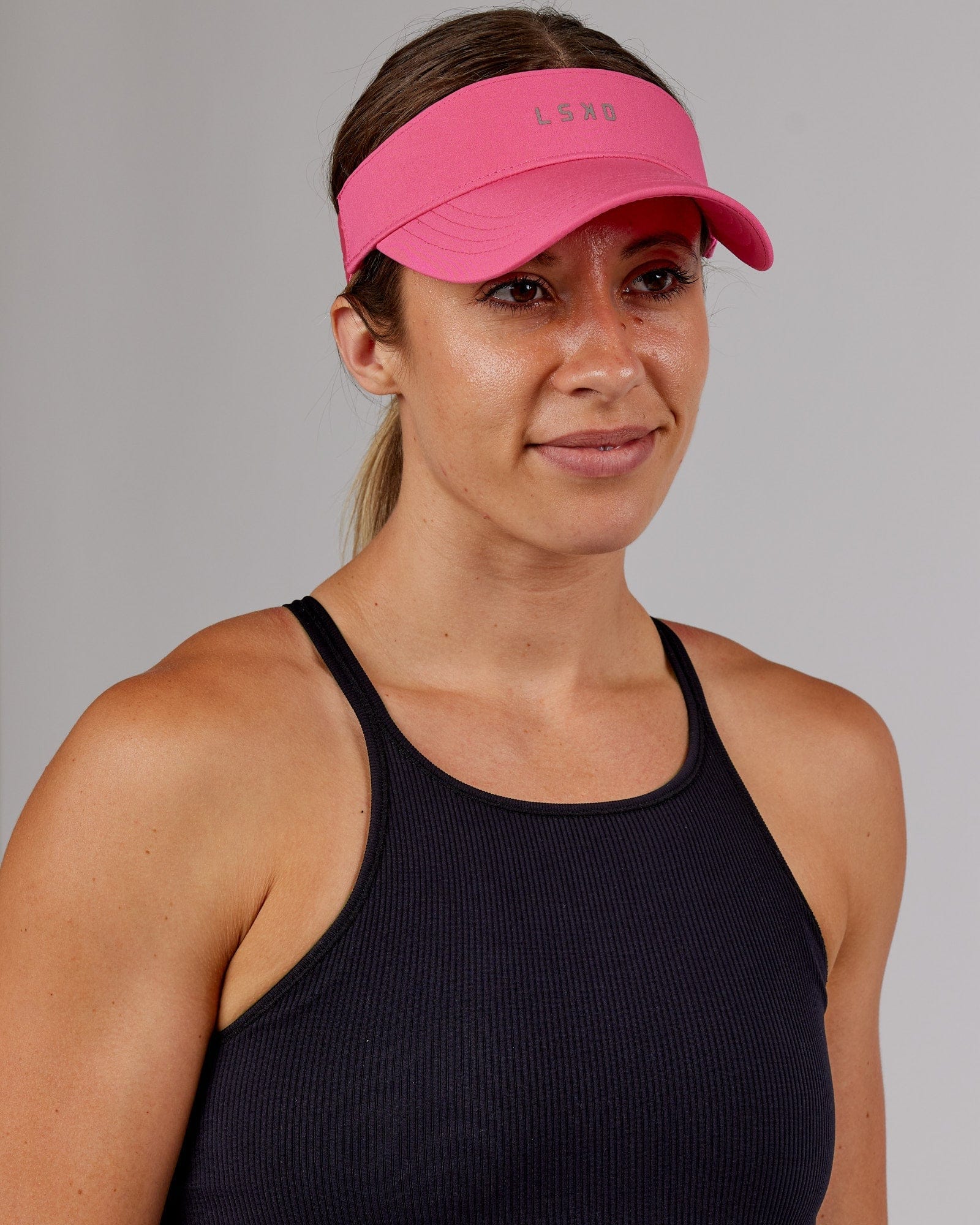 Model wearing Sprint Performance Visor - Flamingo