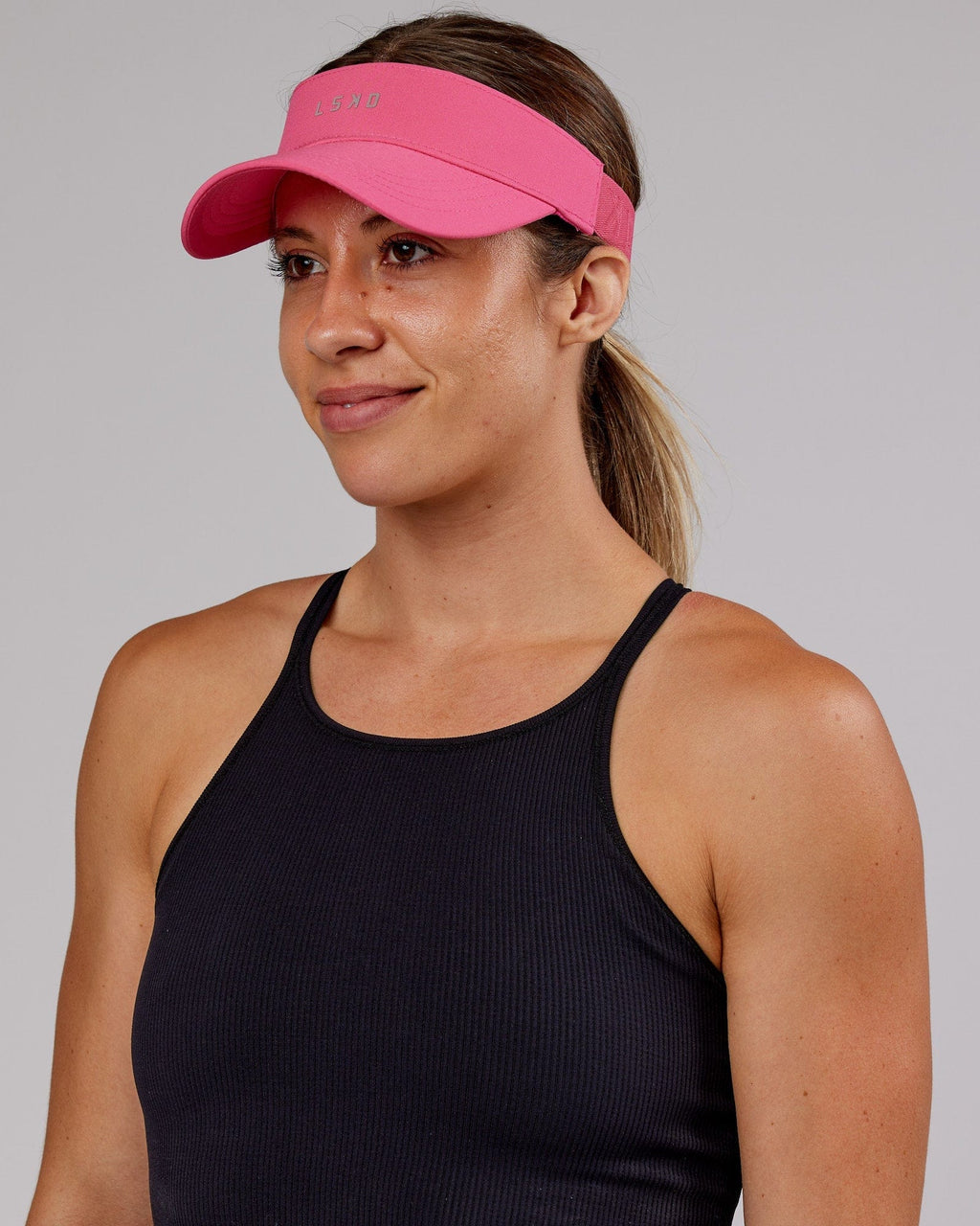 Model wearing Sprint Performance Visor - Flamingo