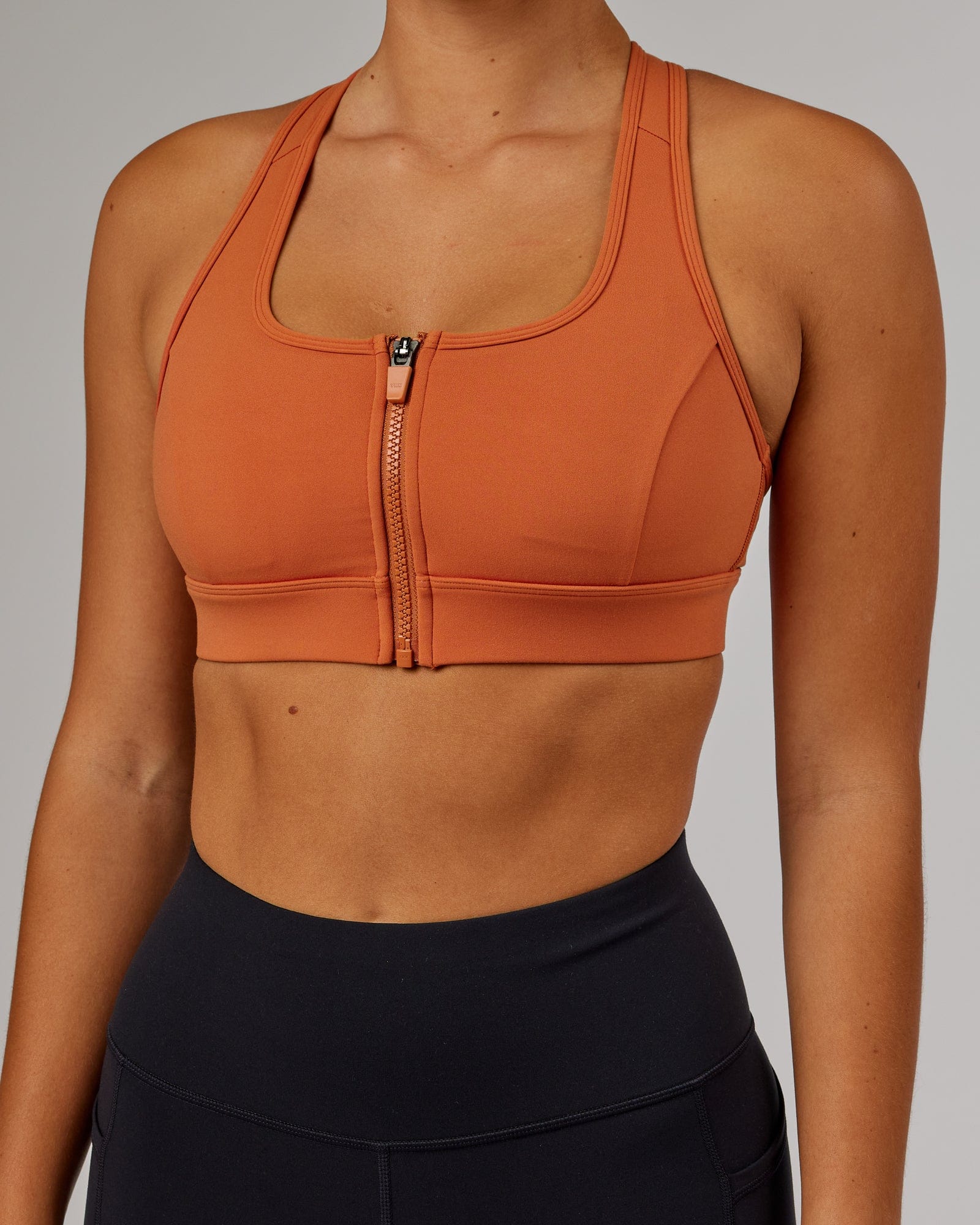 Model wearing Sprint Sports Bra - Auburn