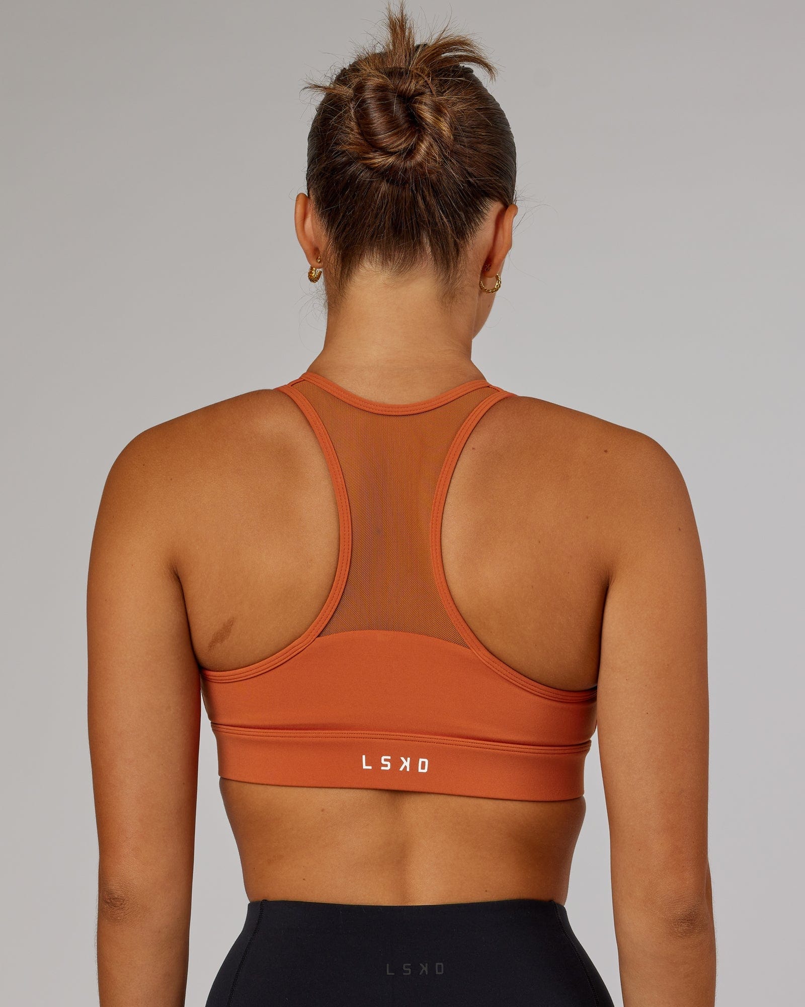 Model wearing Sprint Sports Bra - Auburn