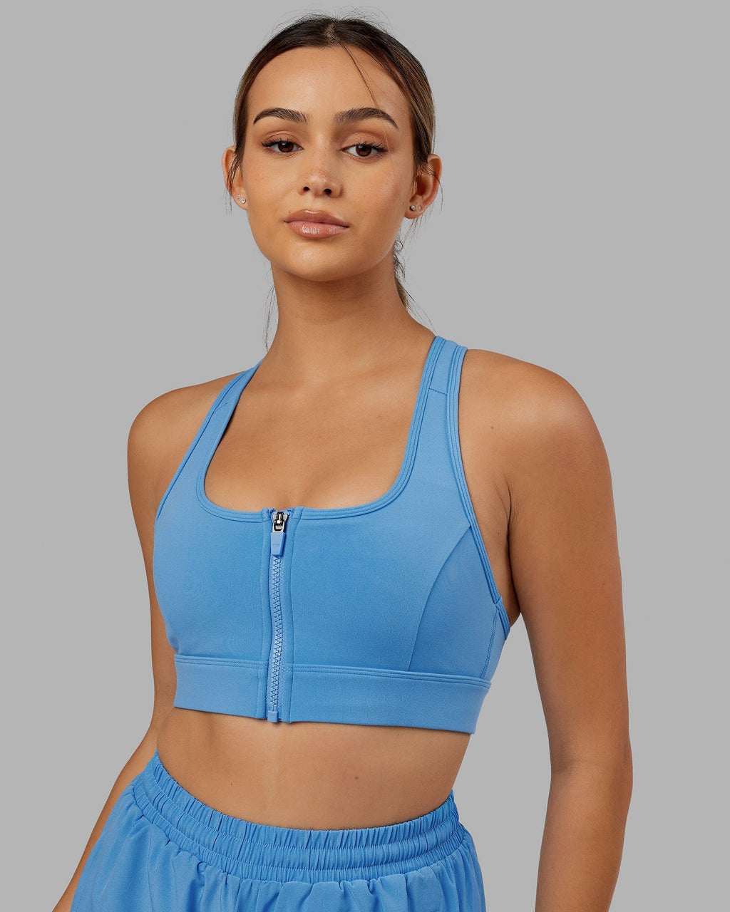Model wearing Sprint Sports Bra - Azure Blue