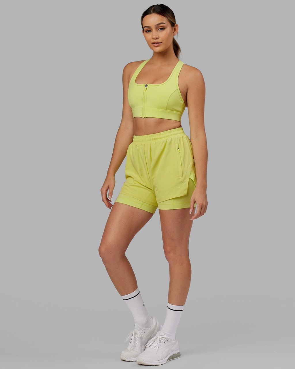 Model wearing Sprint Sports Bra - Citrus Green