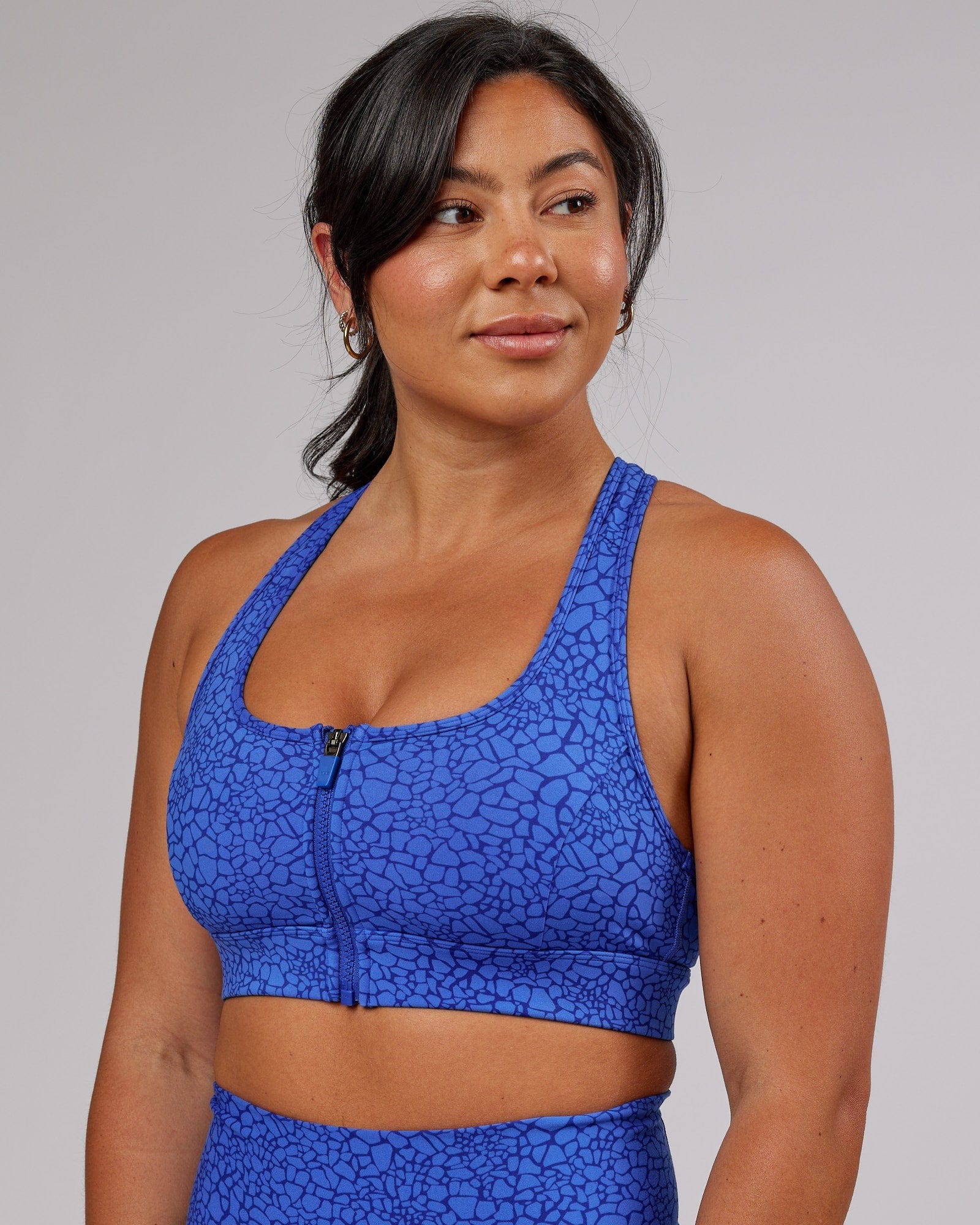 Model wearing Sprint Sports Bra - Ocean Scale