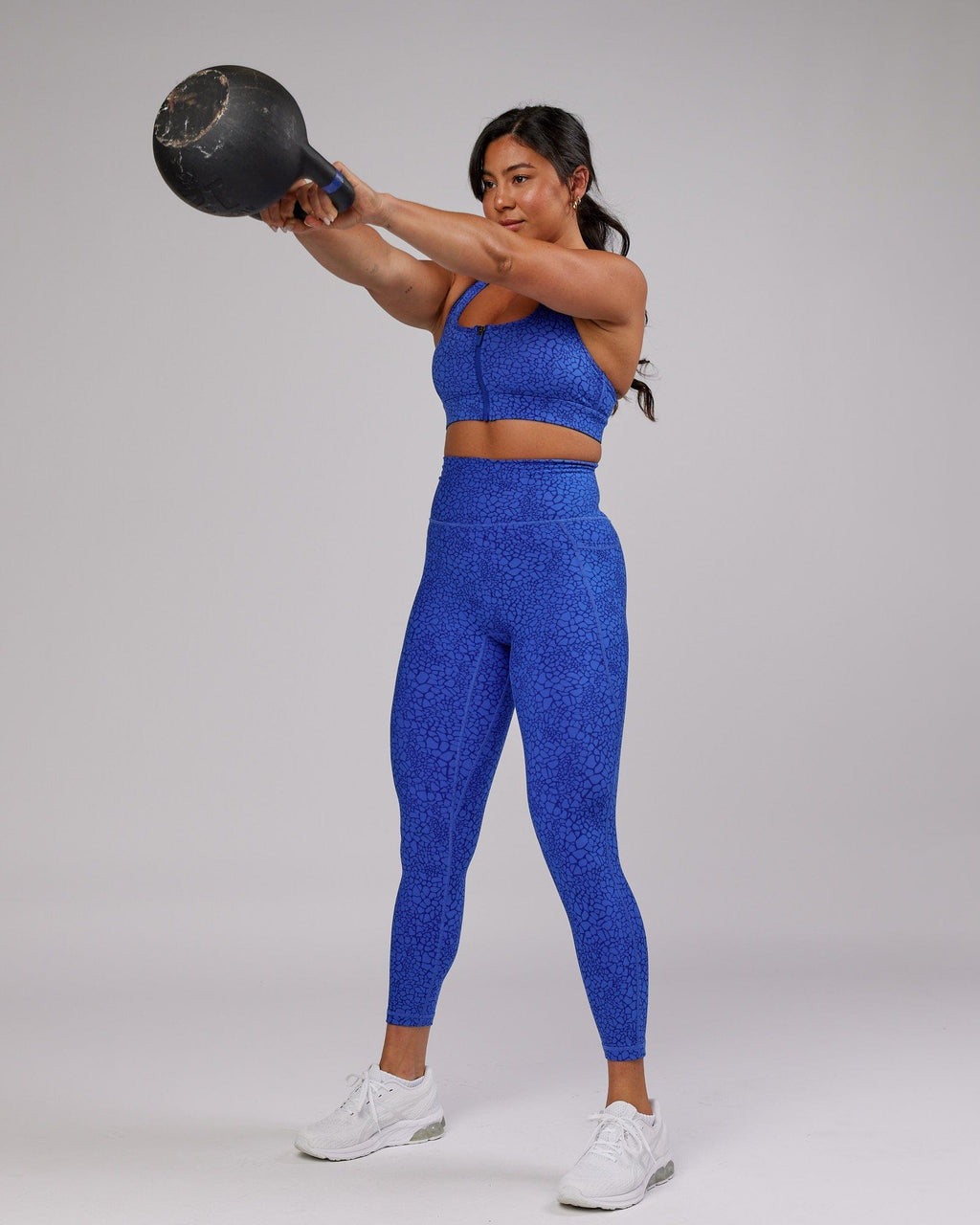 Model wearing Sprint Sports Bra - Ocean Scale