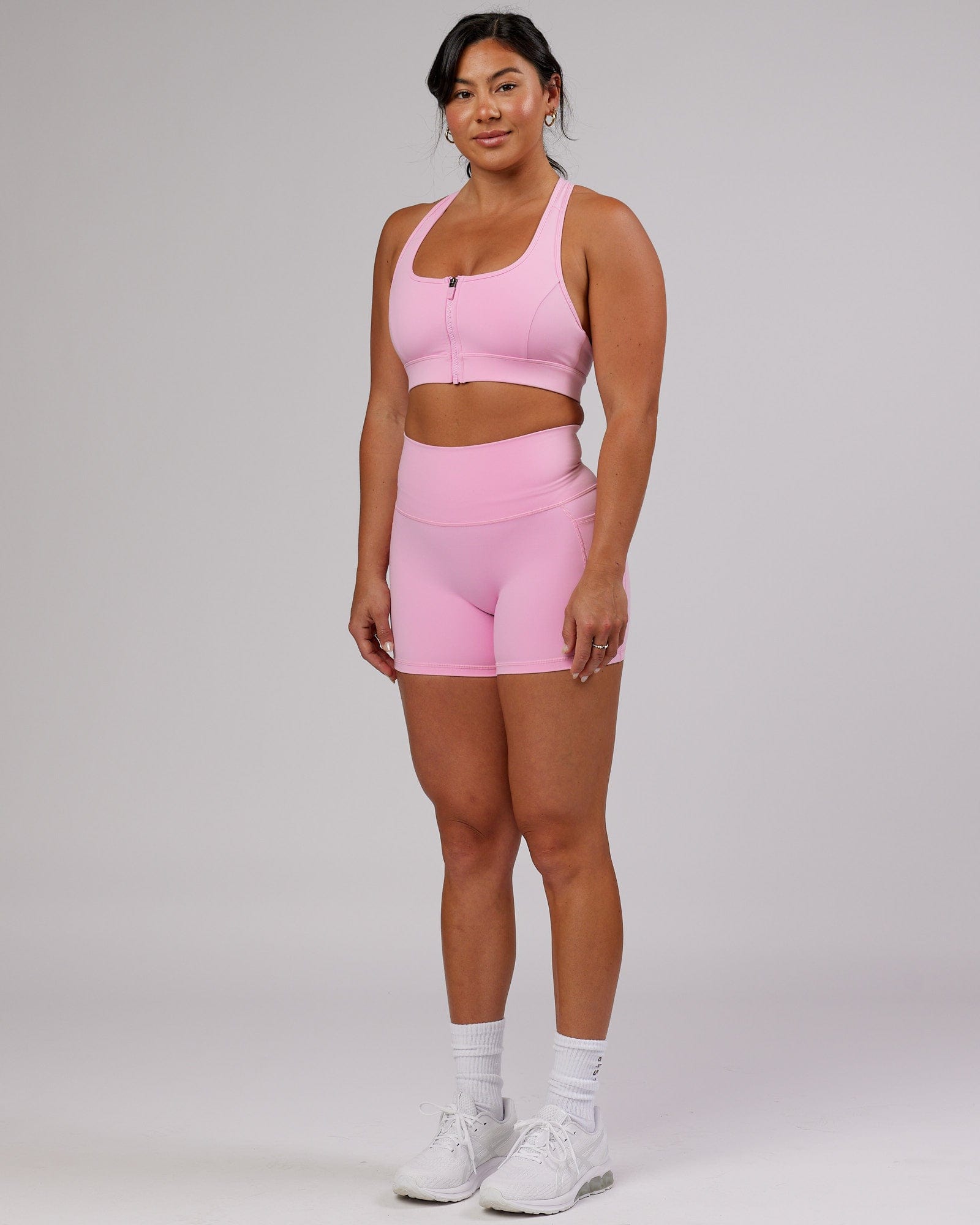 Model wearing Sprint Sports Bra - Pink Frosting