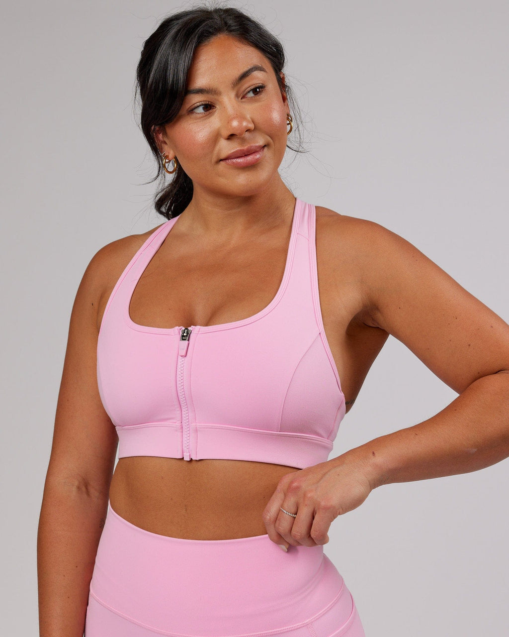 Model wearing Sprint Sports Bra - Pink Frosting