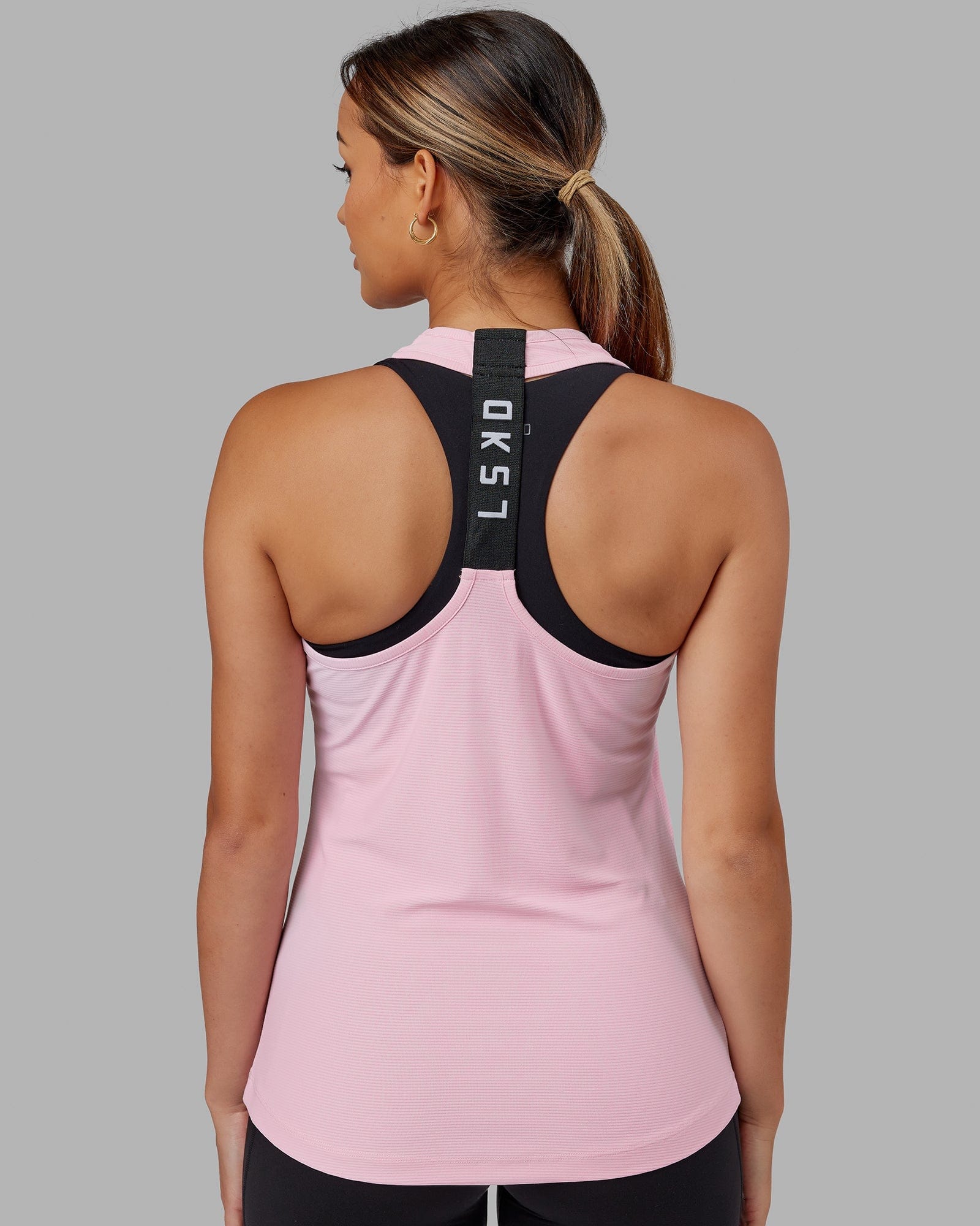 Model wearing Sprint Tank - Petal Pink