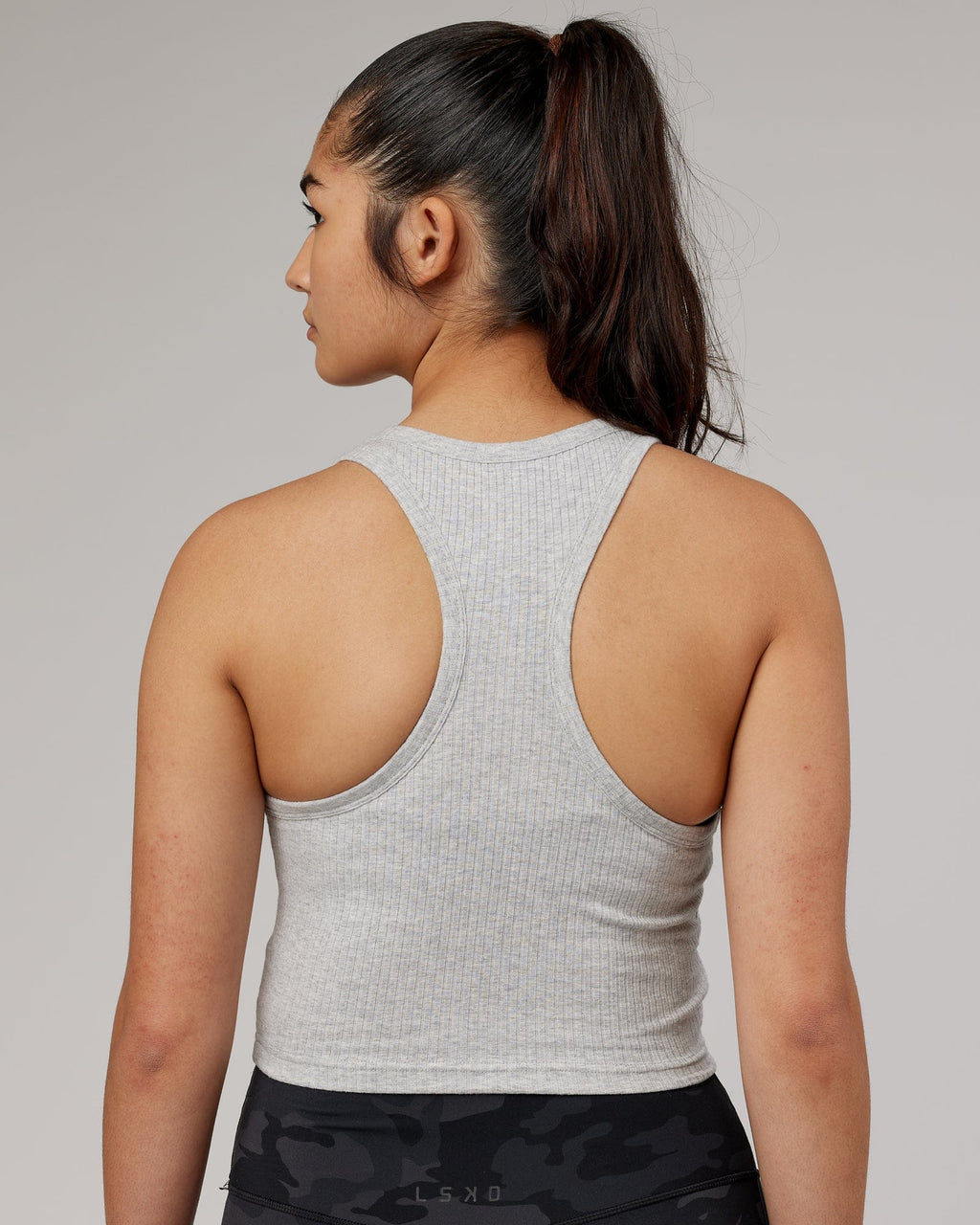 Model wearing Squad Ribbed Tank - Lt Grey Marl