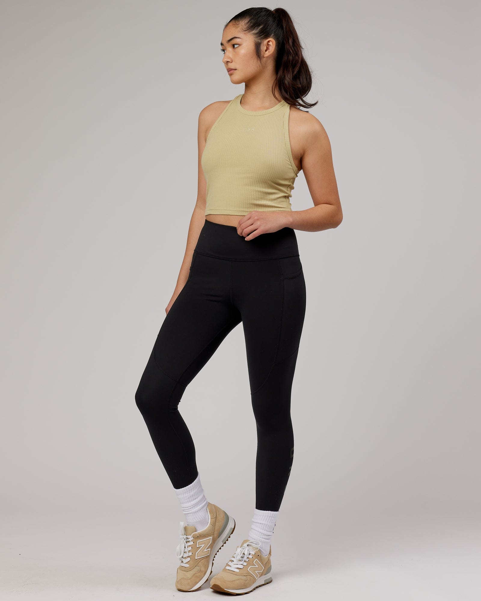 Model wearing Squad Ribbed Tank - Pale Khaki