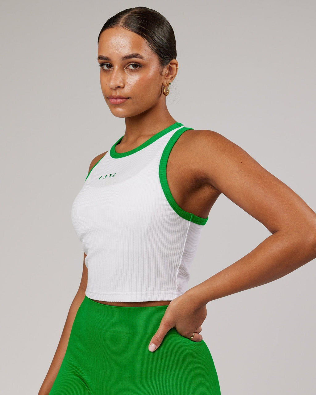 Model wearing Squad Ribbed Crop Tank - White-Vivid Green