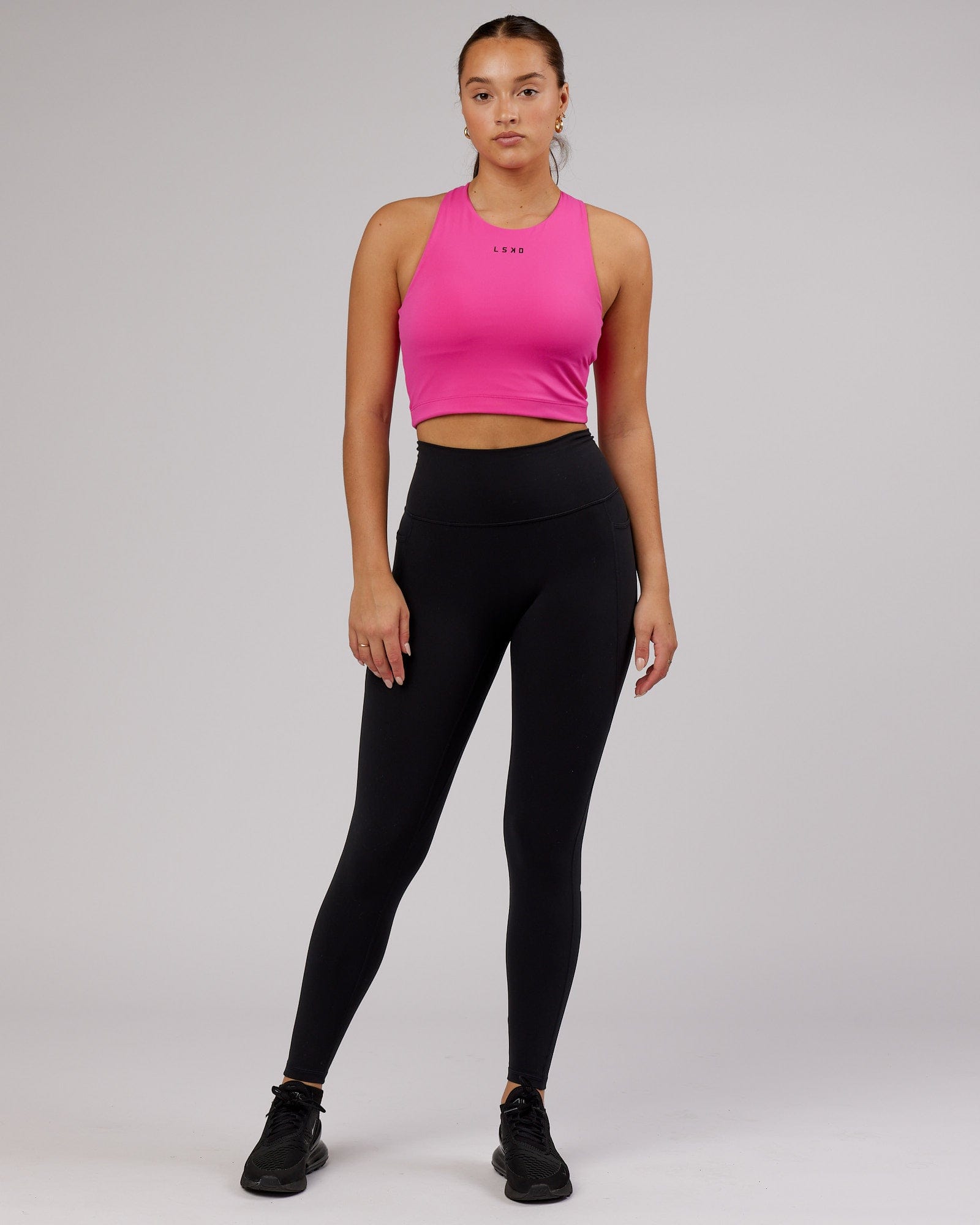 Model wearing Status Shelf Bra Active Tank - Magenta