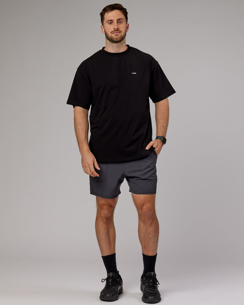 Model wearing Street Tech Short - Asphalt
