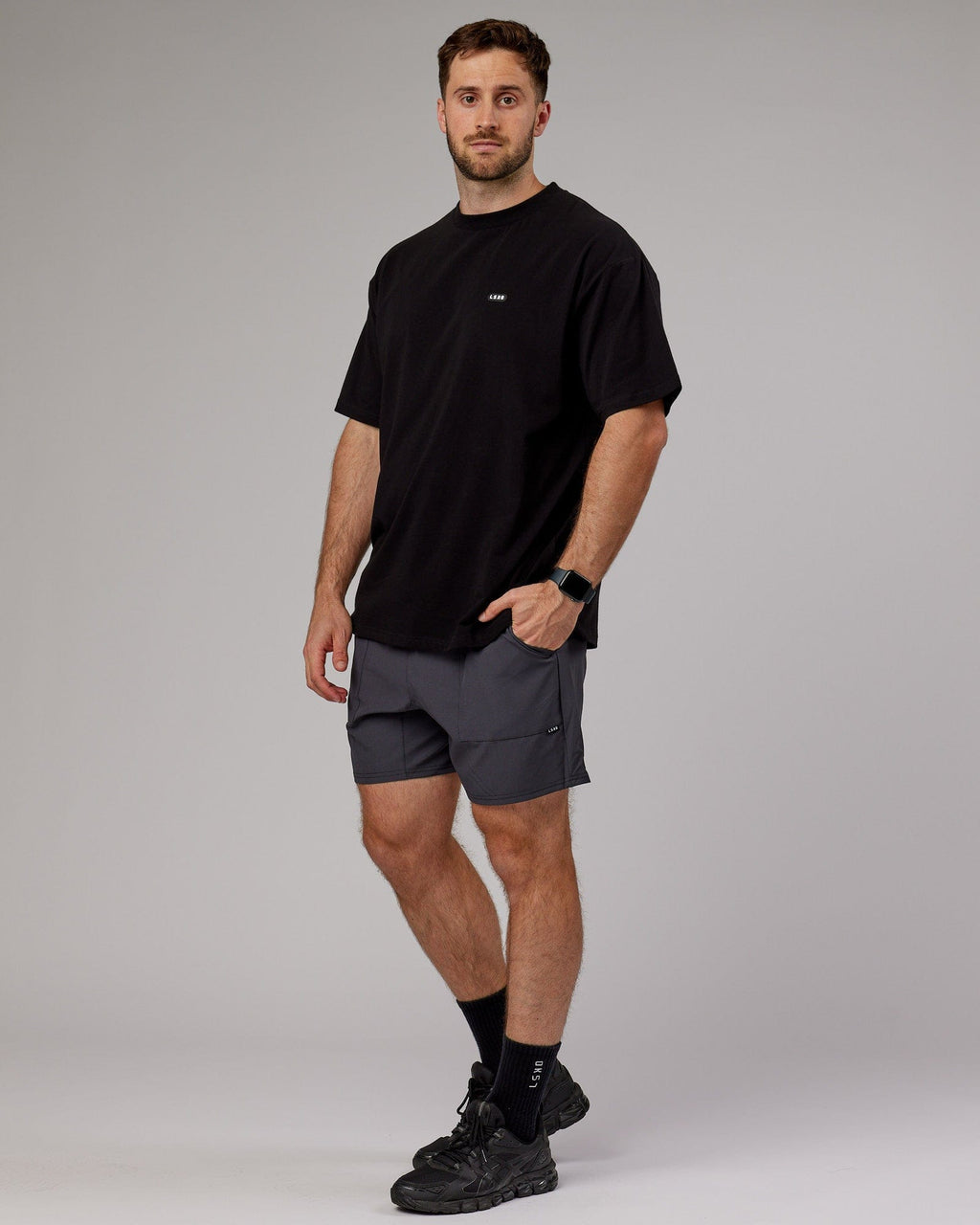 Model wearing Street Tech Short - Asphalt