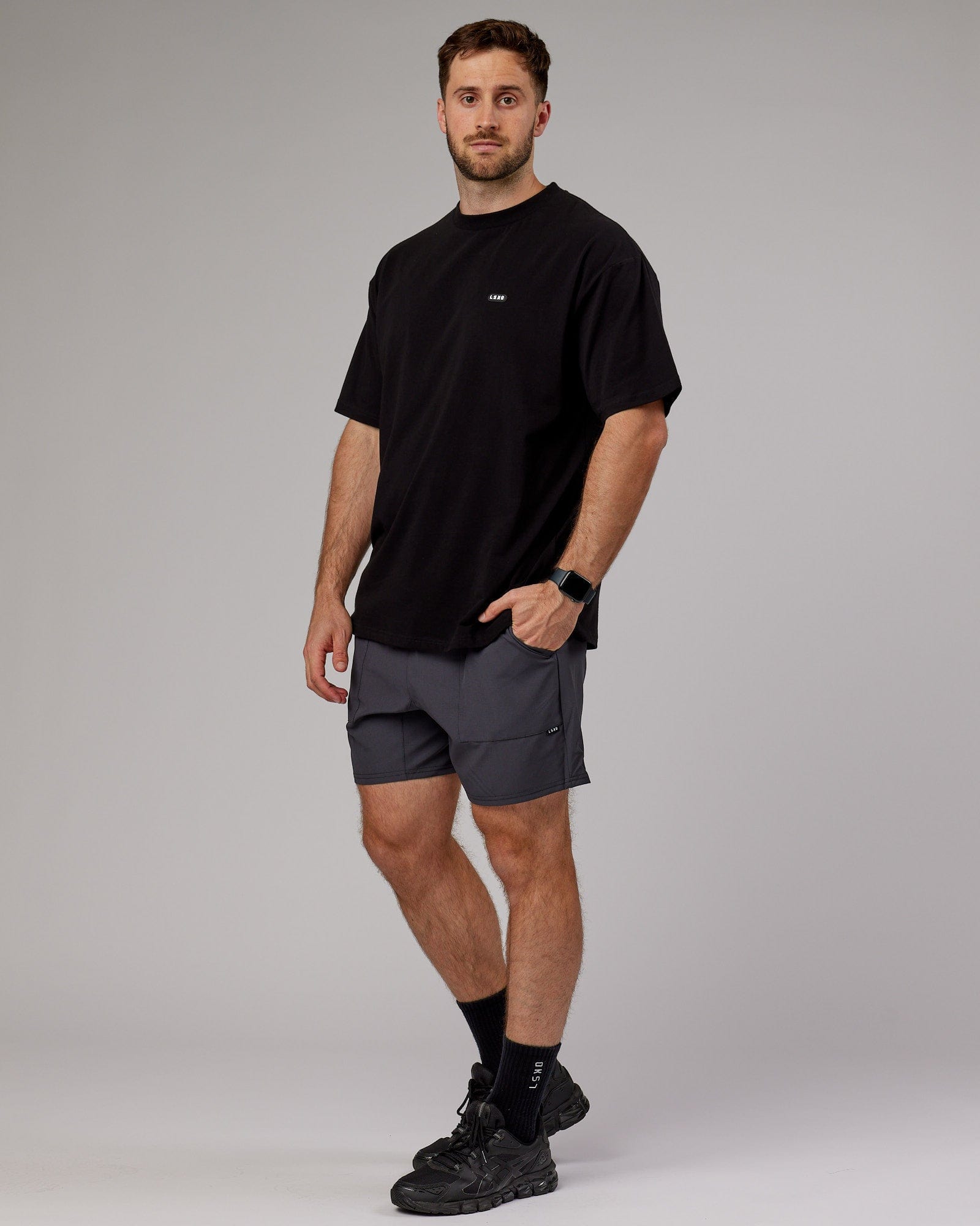 Model wearing Street Tech Short - Asphalt