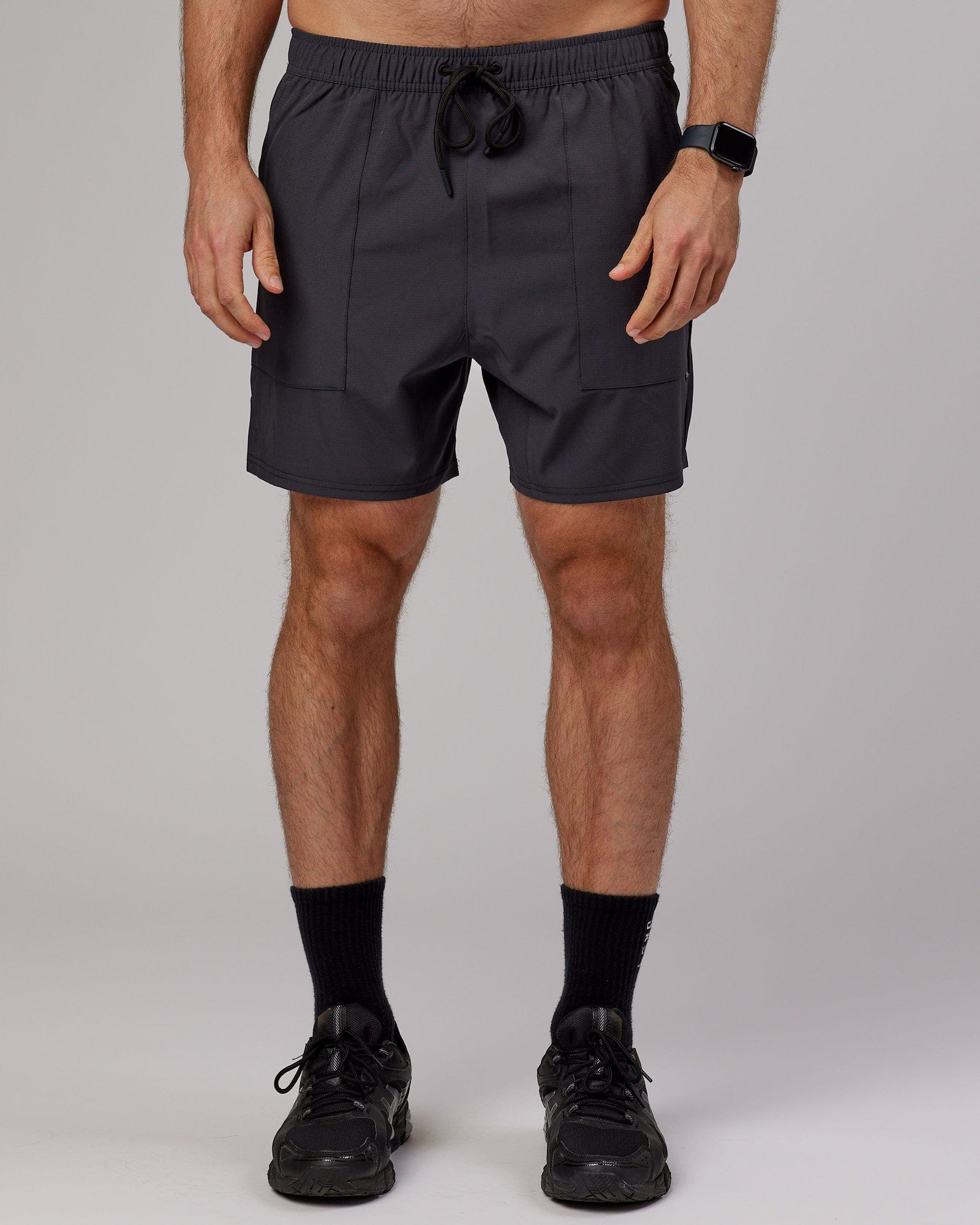 Model wearing Street Tech Short - Asphalt