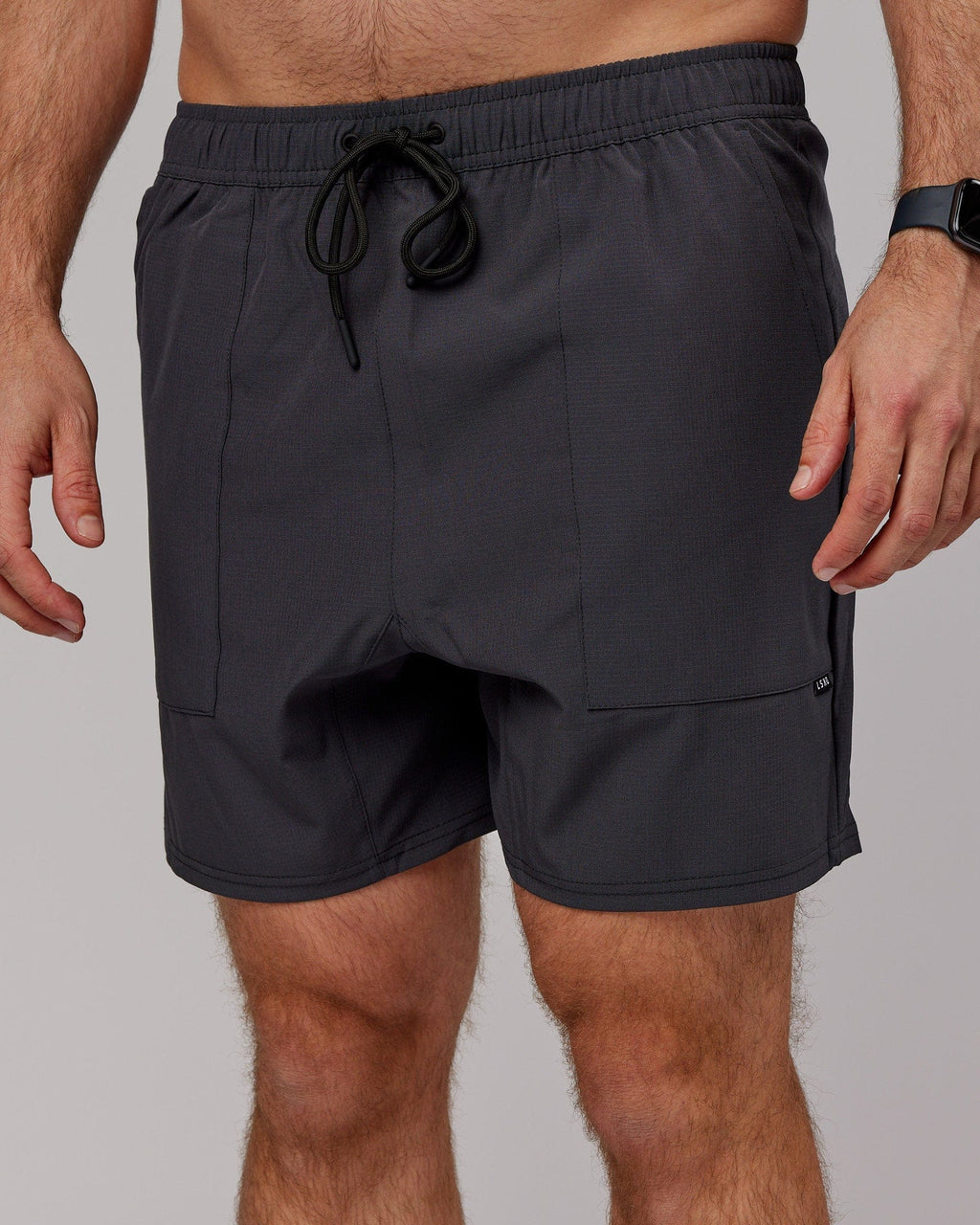 Model wearing Street Tech Short - Asphalt