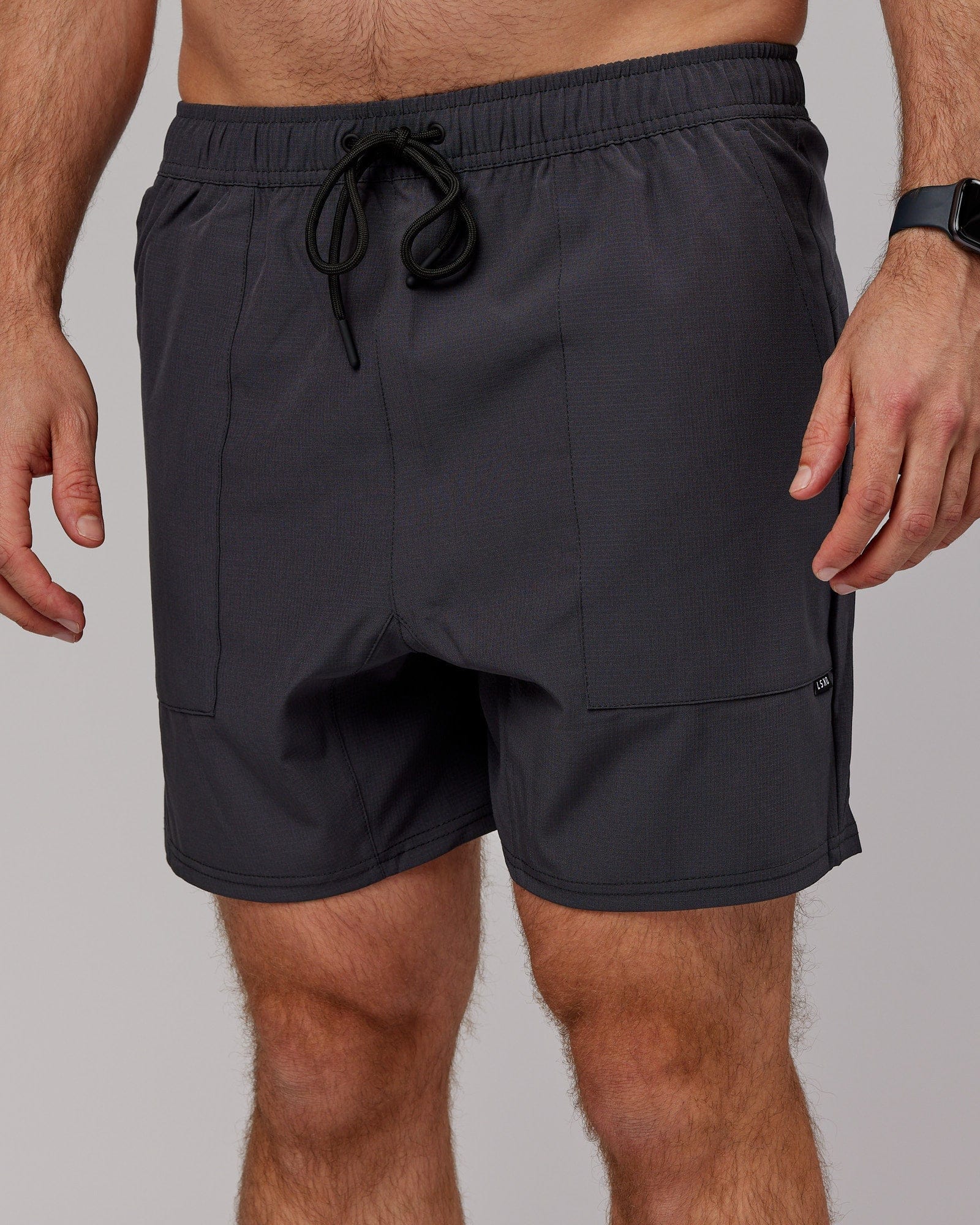 Model wearing Street Tech Short - Asphalt