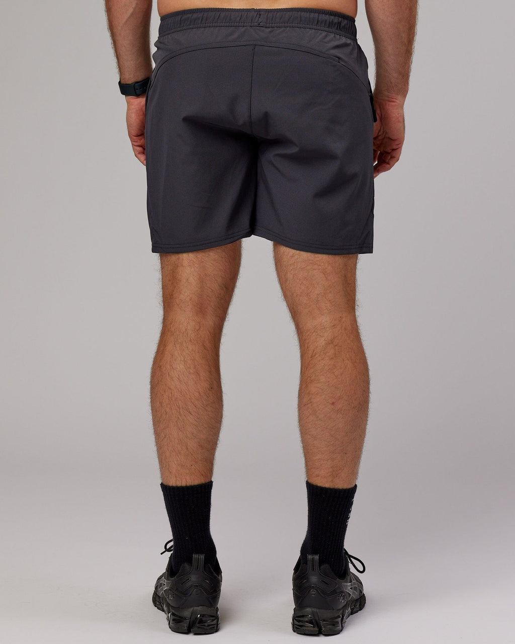 Model wearing Street Tech Short - Asphalt