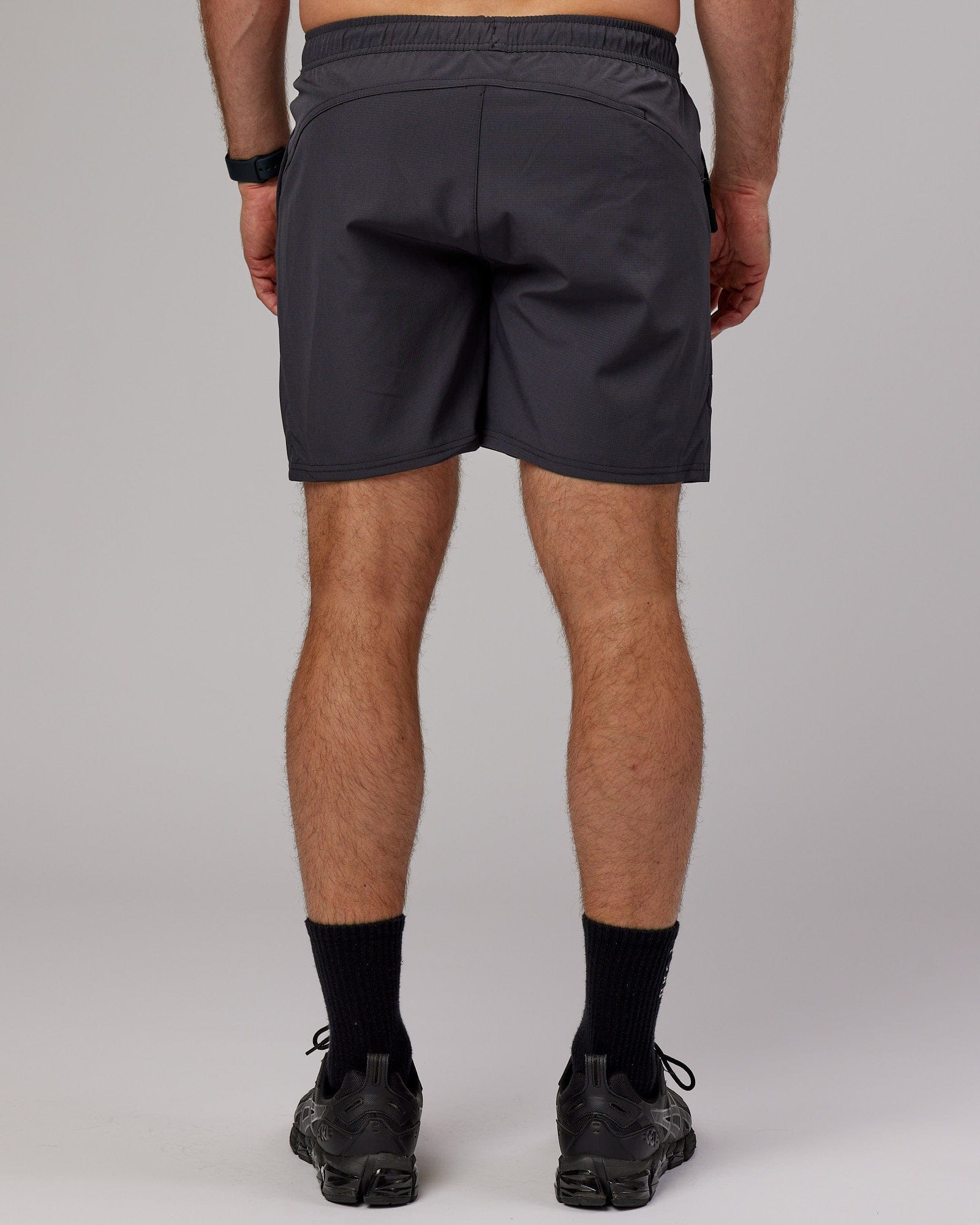 Model wearing Street Tech Short - Asphalt