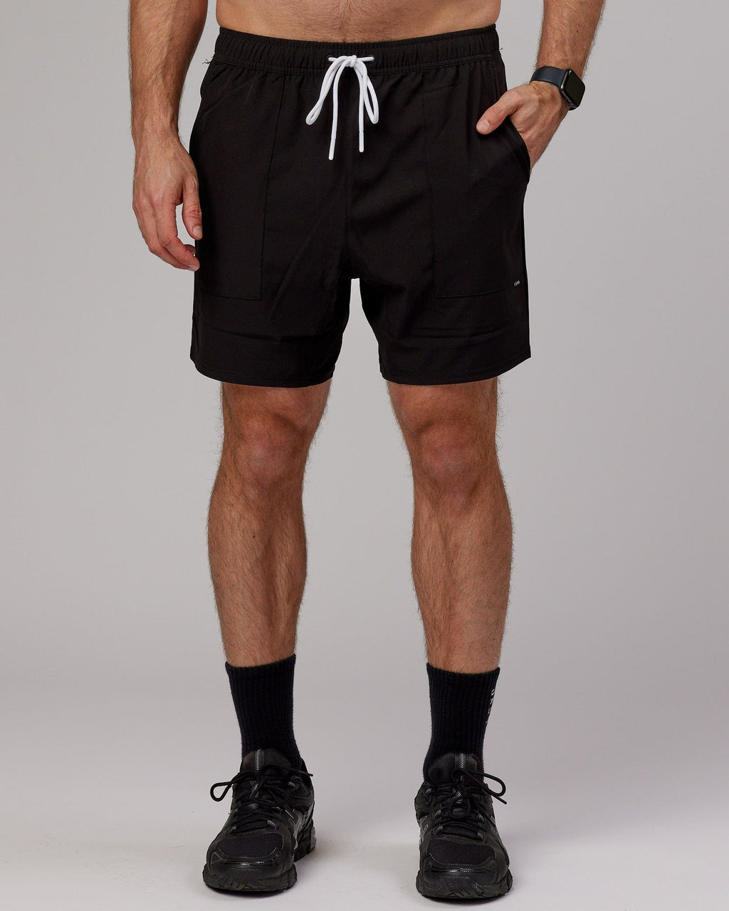 Model wearing Street Tech Short - Black