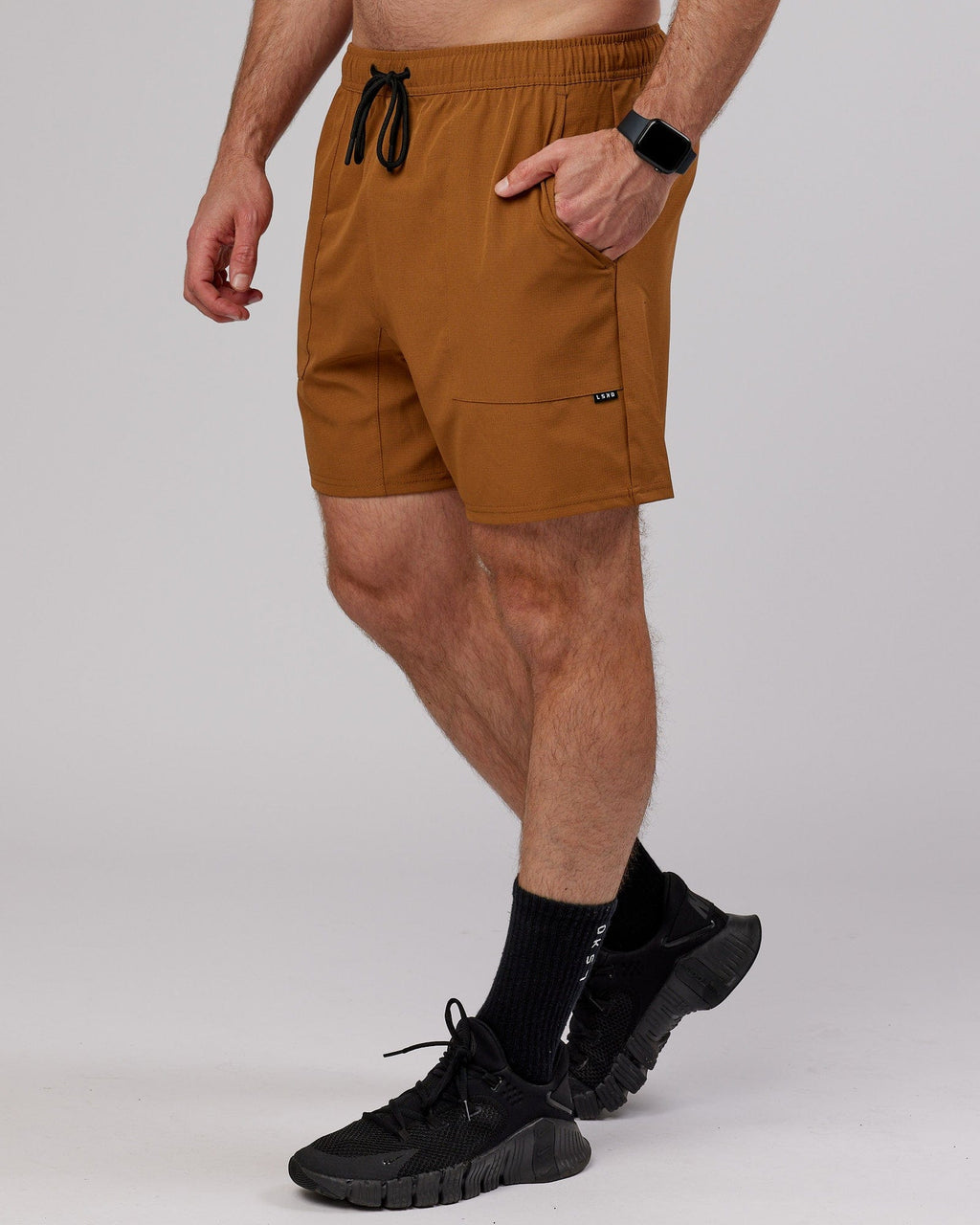 Model wearing Street Tech Short - Camel