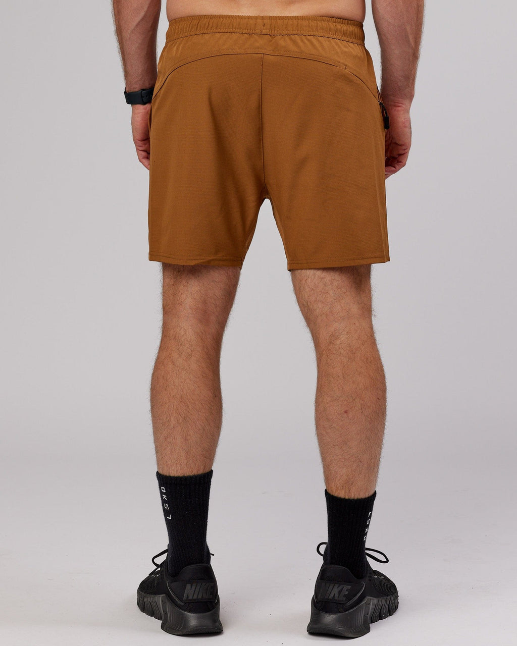 Model wearing Street Tech Short - Camel