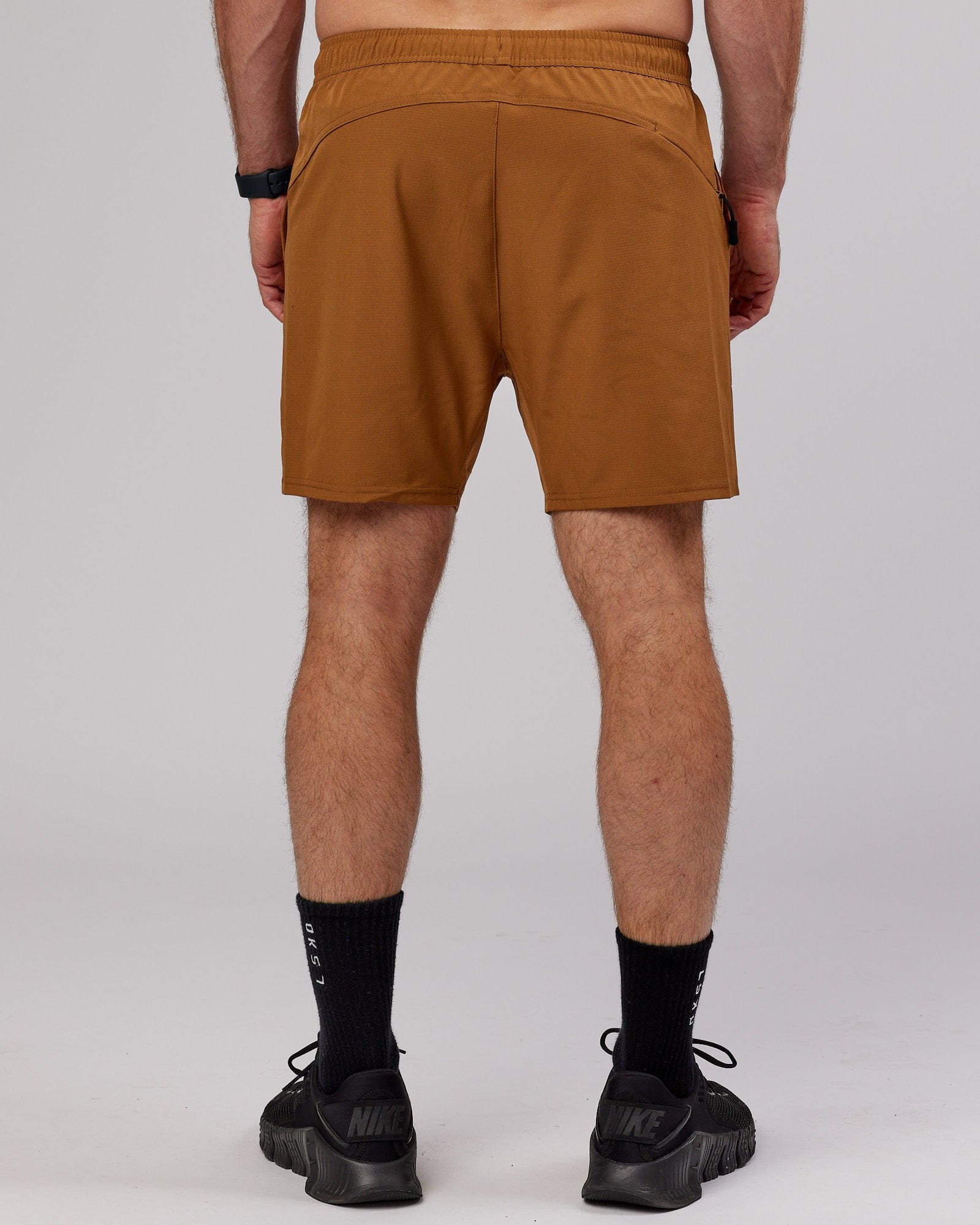 Model wearing Street Tech Short - Camel