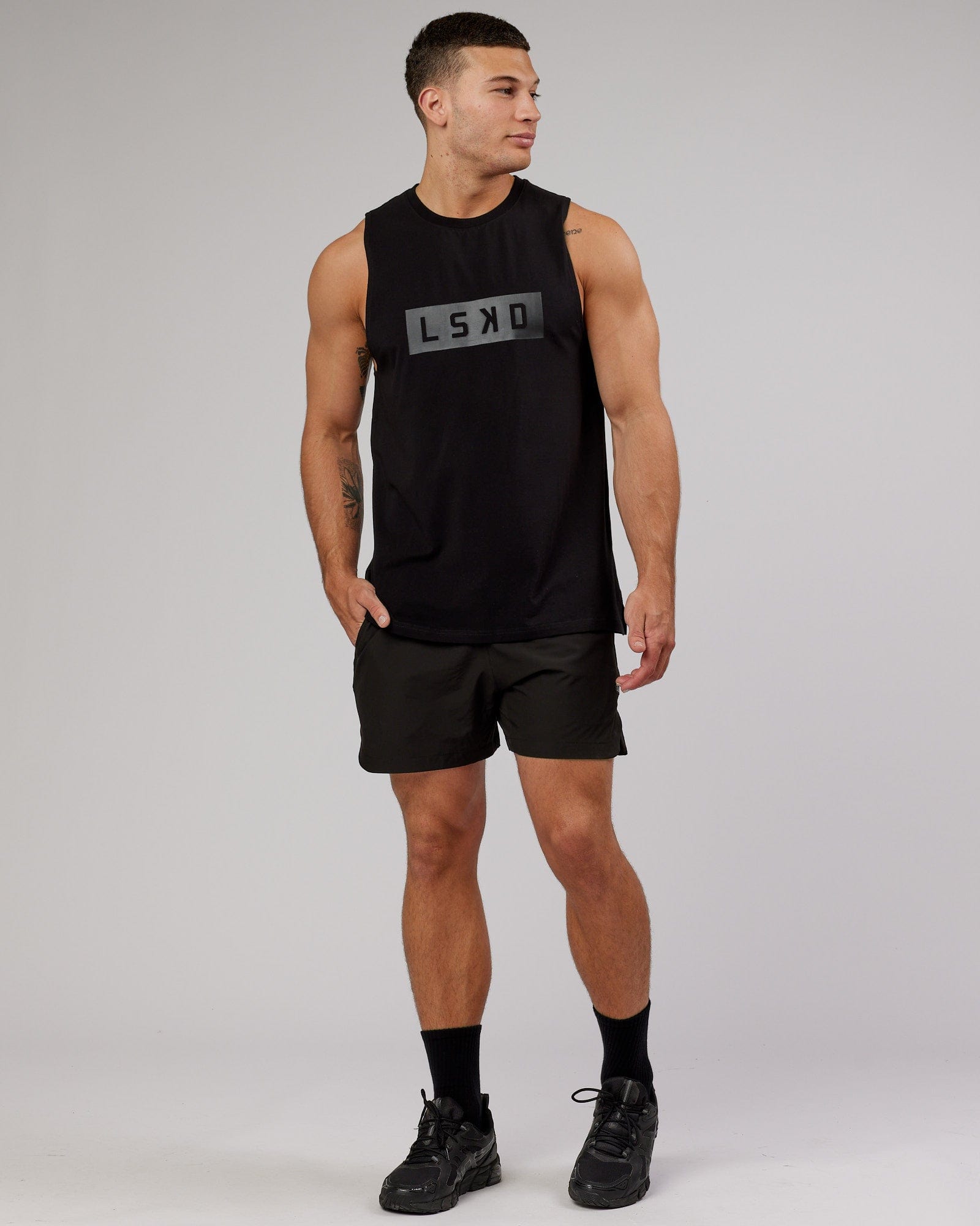Model wearing Strength FLXCotton Training Fit Tank - Black-Black