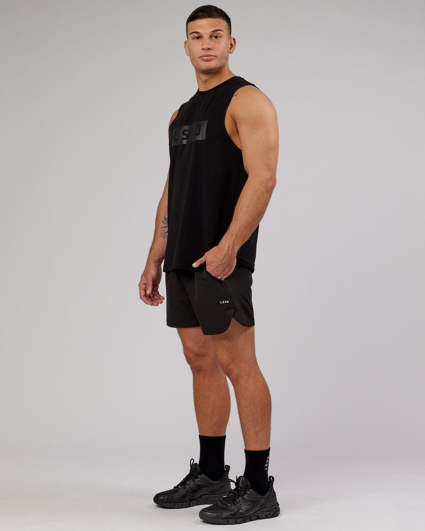 Model wearing Strength FLXCotton Training Fit Tank - Black-Black