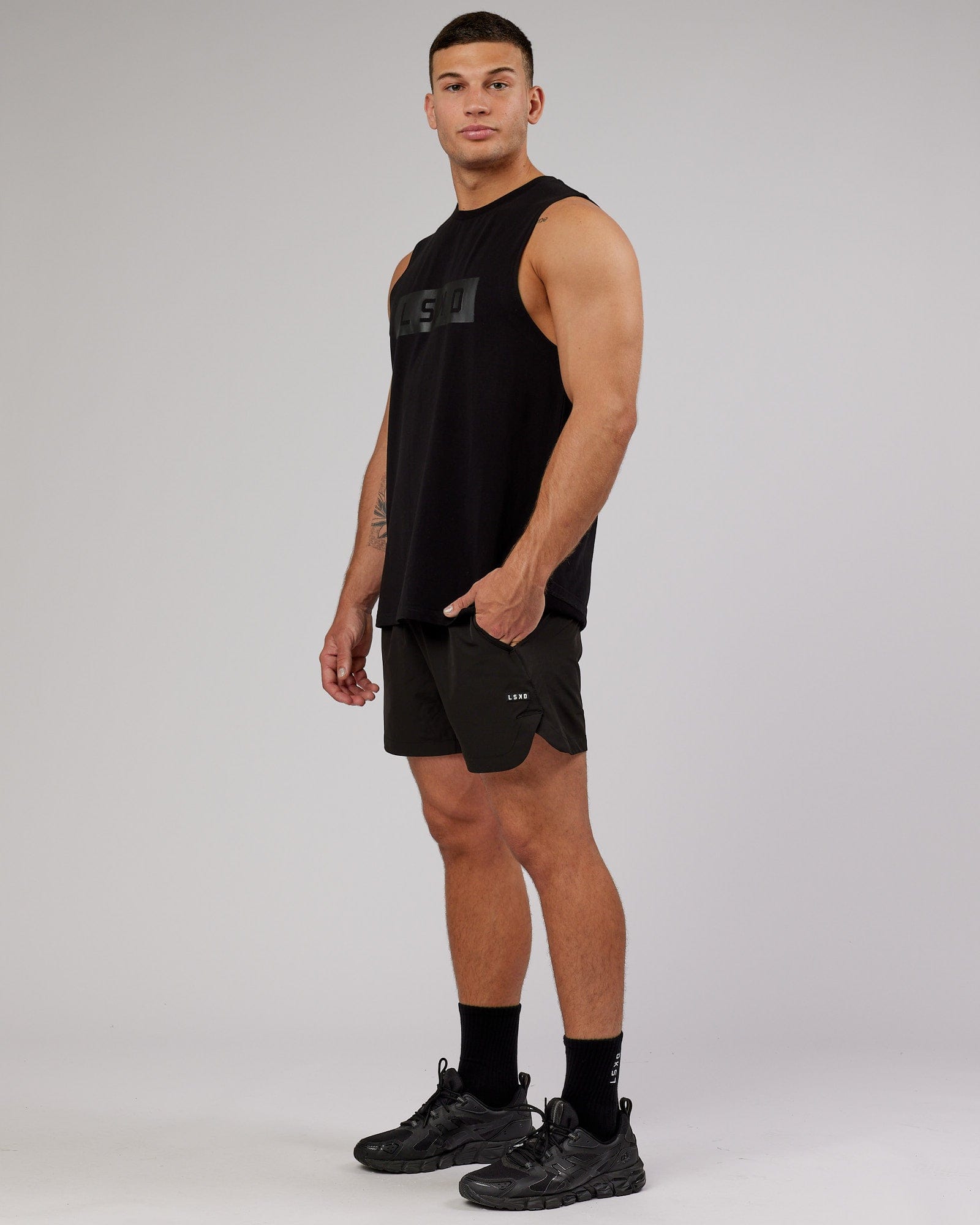 Model wearing Strength FLXCotton Training Fit Tank - Black-Black