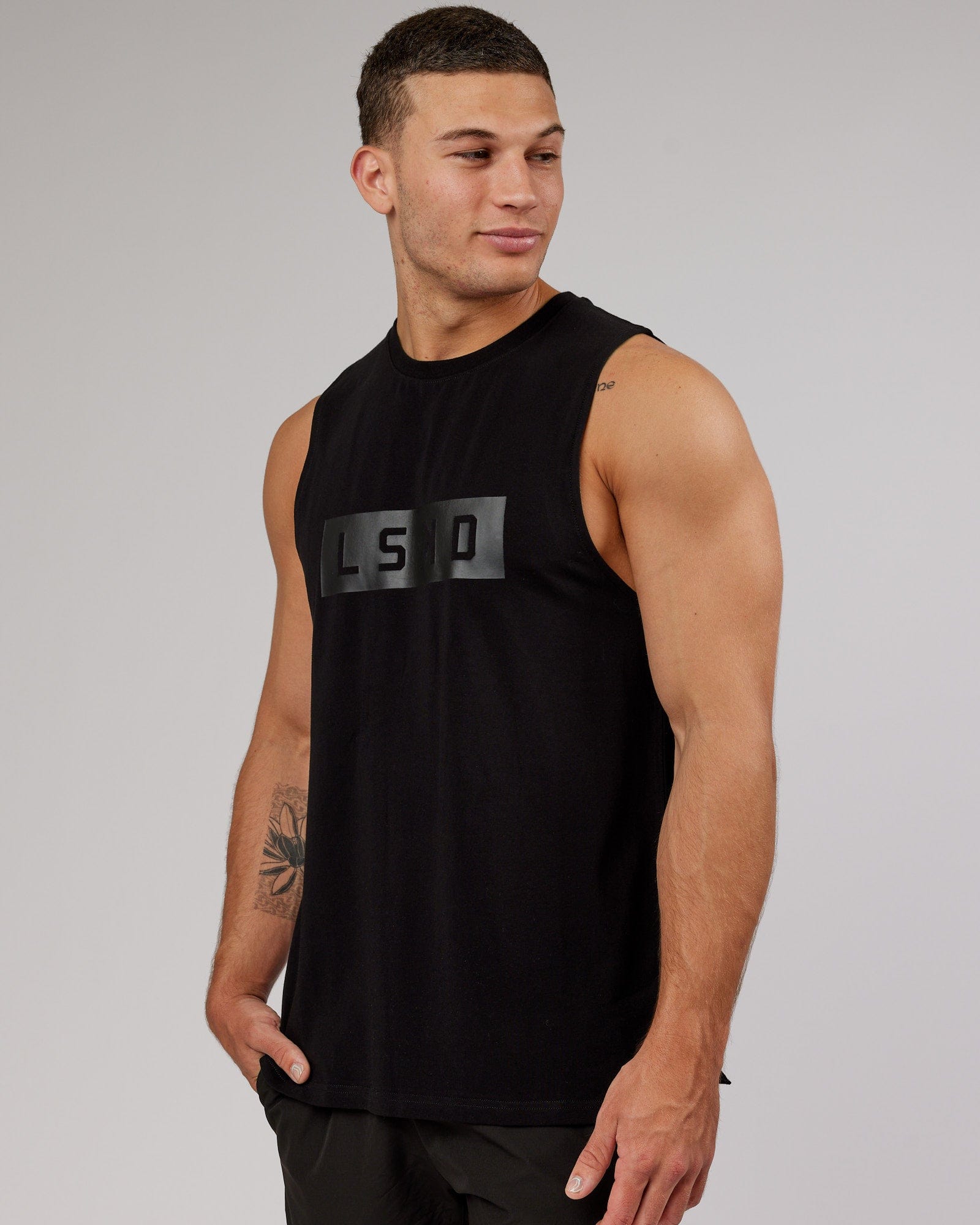 Model wearing Strength FLXCotton Training Fit Tank - Black-Black