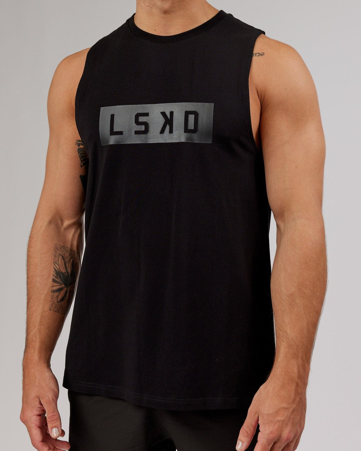 Model wearing Strength FLXCotton Training Fit Tank - Black-Black