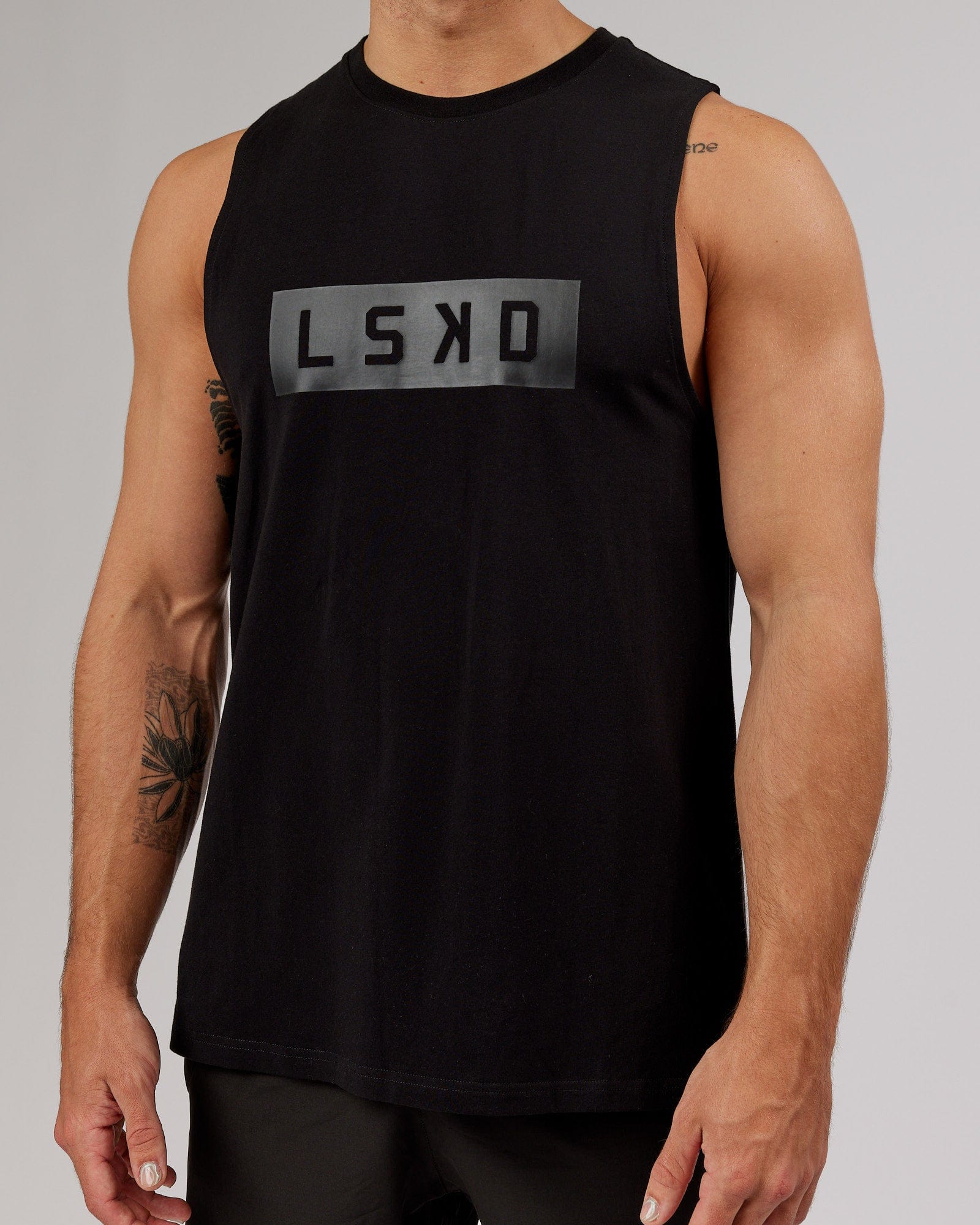 Model wearing Strength FLXCotton Training Fit Tank - Black-Black
