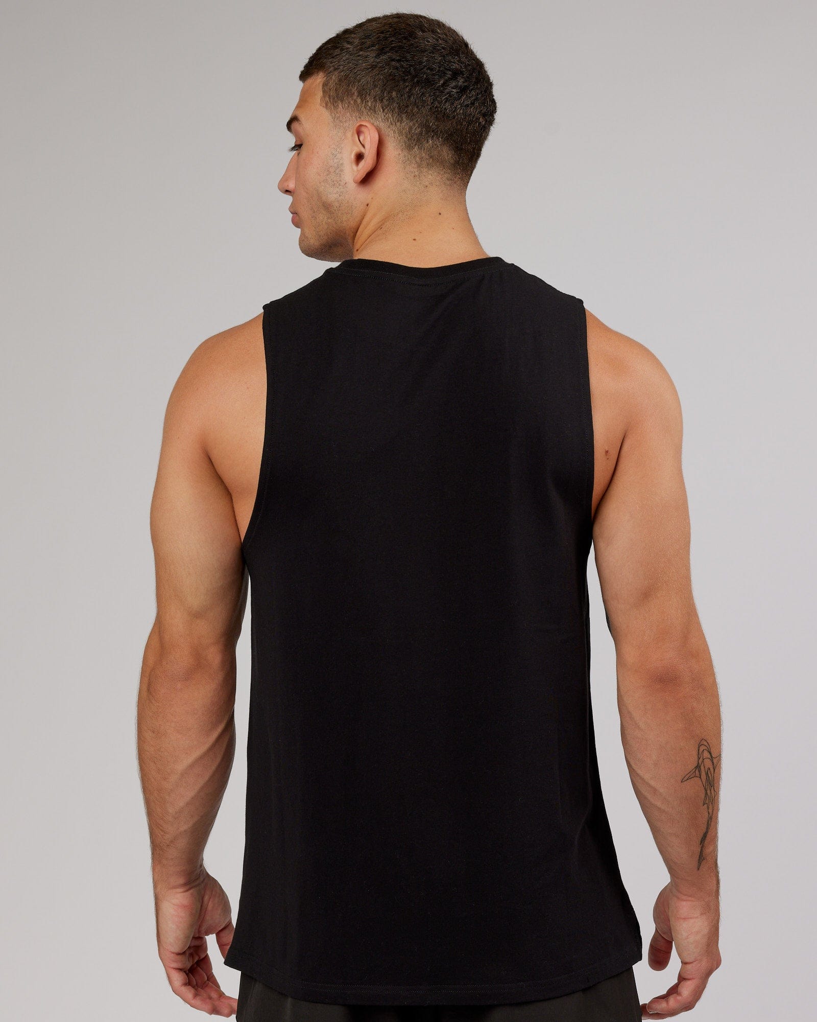 Model wearing Strength FLXCotton Training Fit Tank - Black-Black