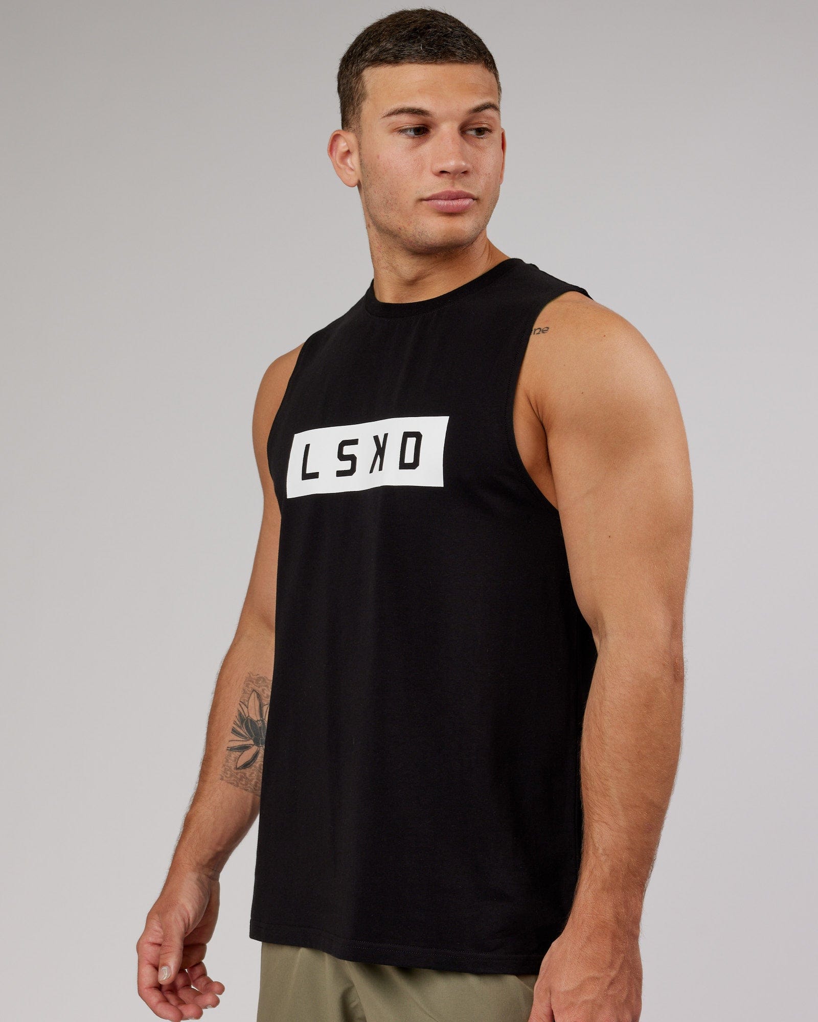Model wearing Strength FLXCotton Training Fit Tank - Black-White
