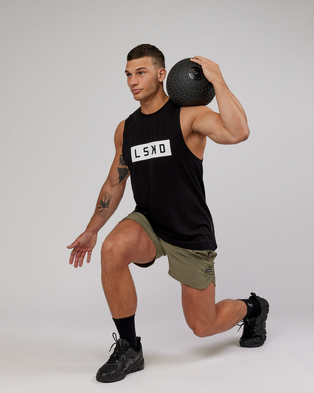 Model wearing Strength FLXCotton Training Fit Tank - Black-White