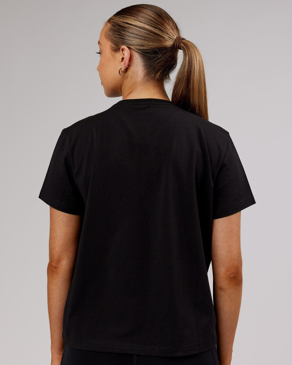 Model wearing Strength FLXCotton Tee - Black-Pink Frosting