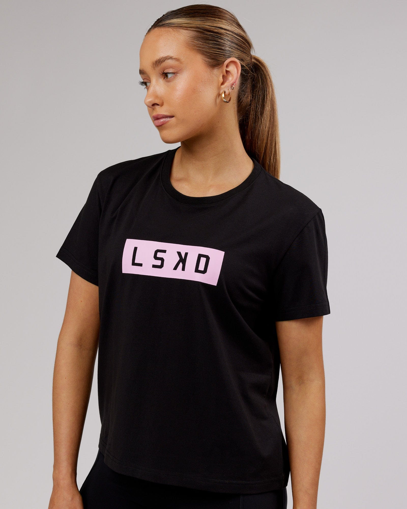 Model wearing Strength FLXCotton Tee - Black-Pink Frosting