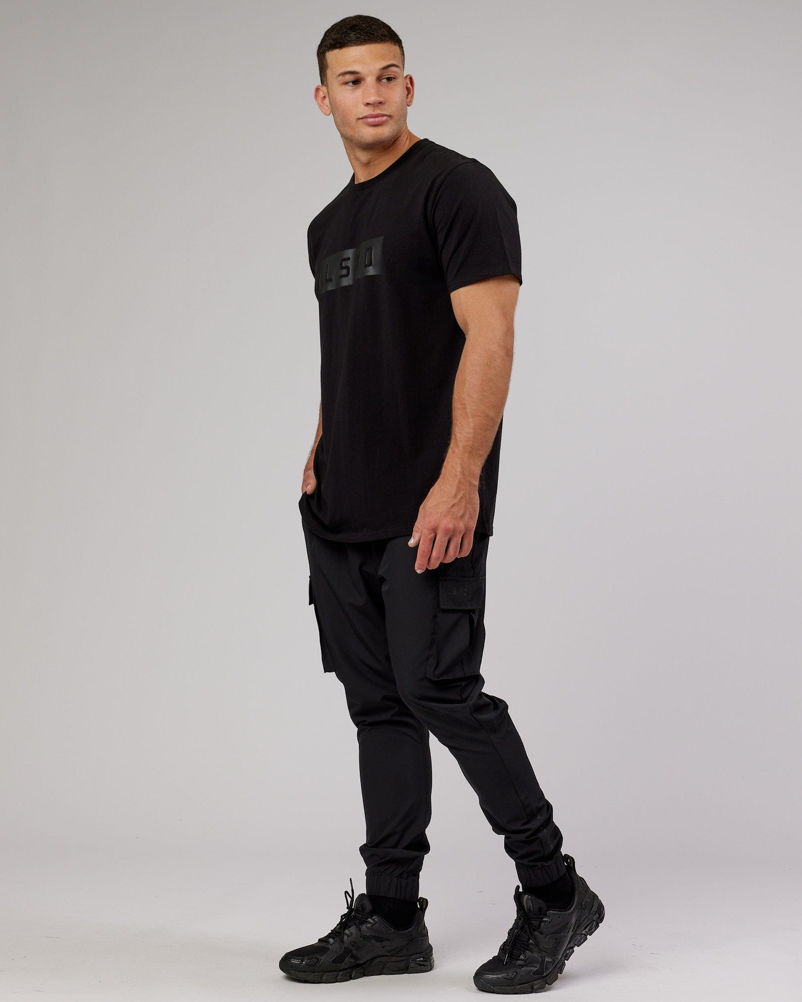 Model wearing Strength FLXCotton Tee - Black-Black
