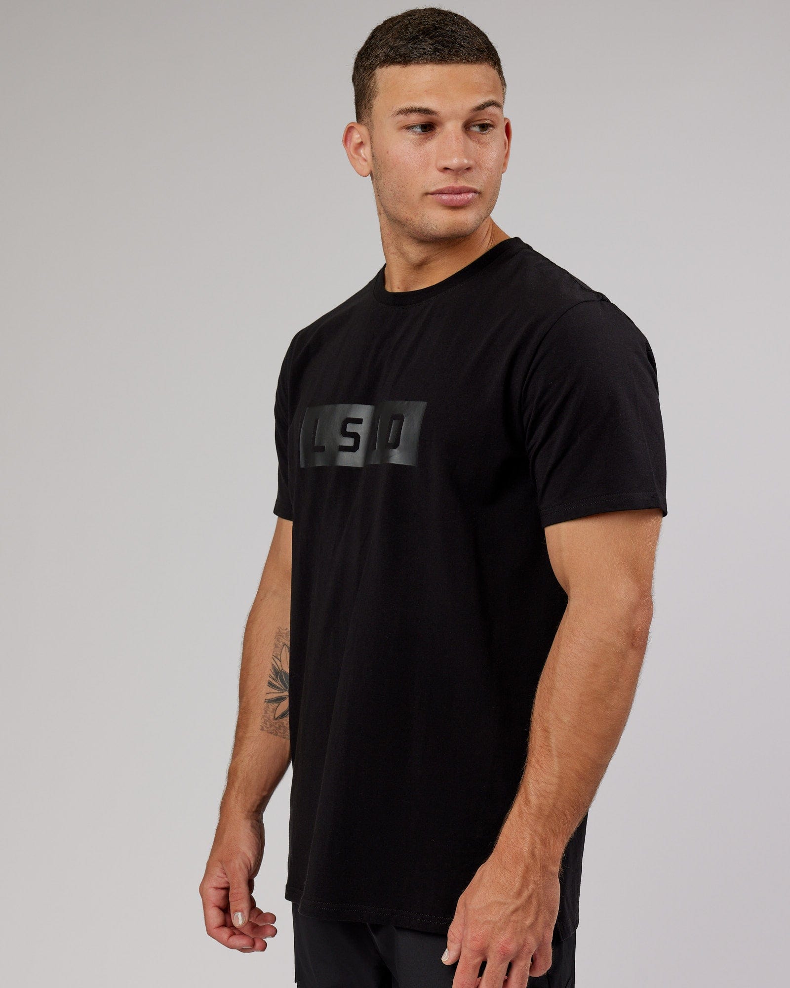 Model wearing Strength FLXCotton Tee - Black-Black