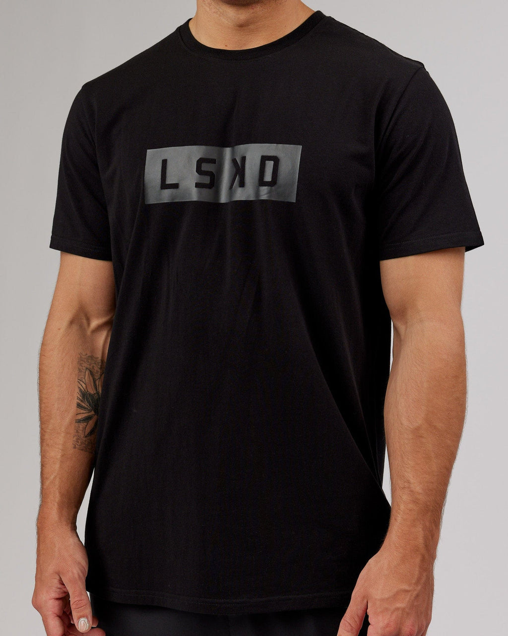 Model wearing Strength FLXCotton Tee - Black-Black