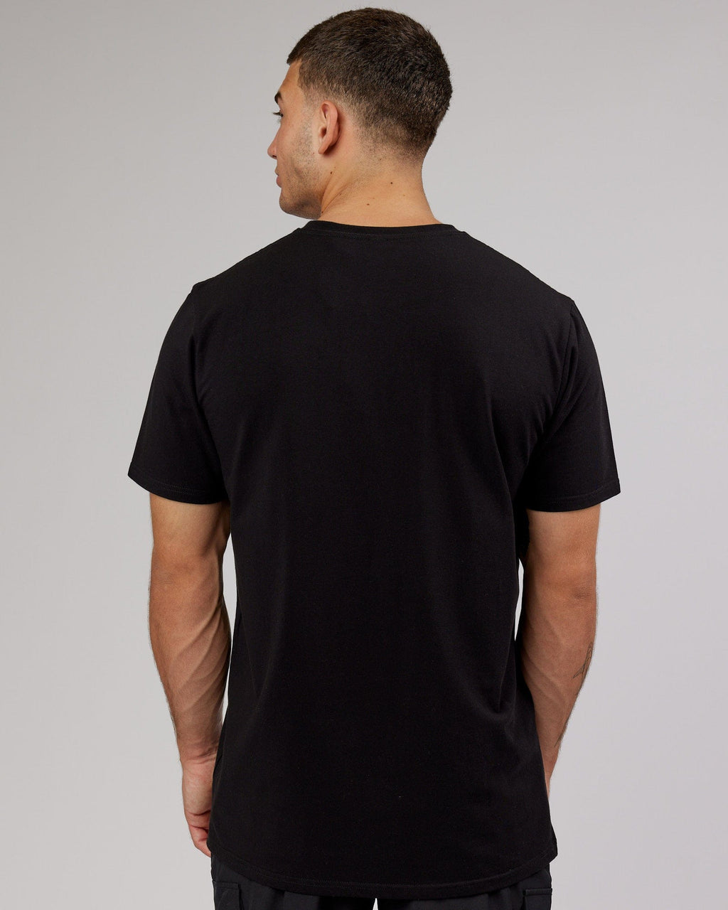 Model wearing Strength FLXCotton Tee - Black-Black
