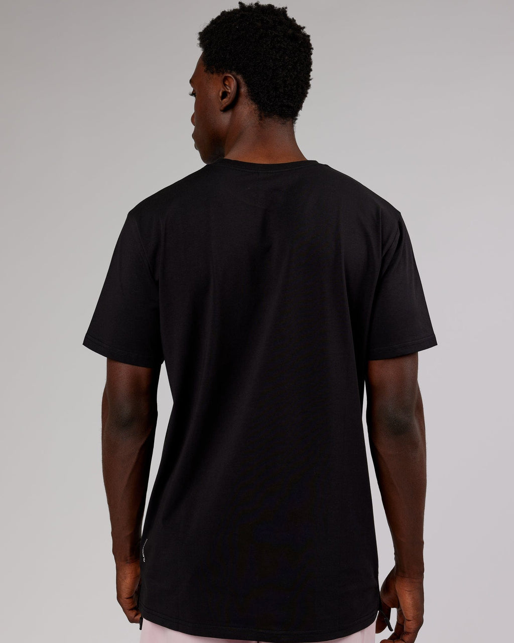 Model wearing Strength FLXCotton Tee - Black-Pink