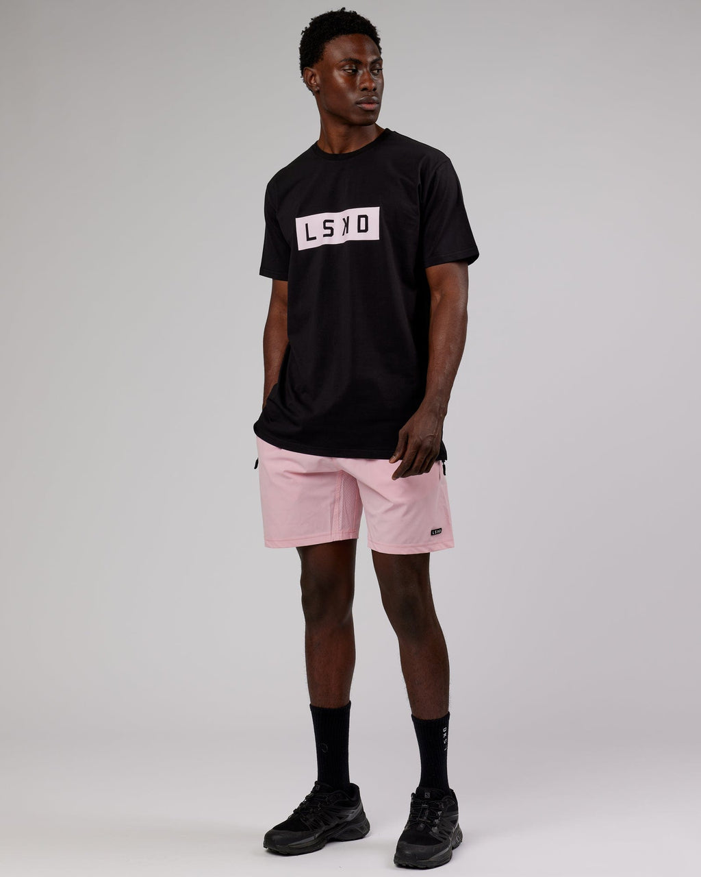 Model wearing Strength FLXCotton Tee - Black-Pink