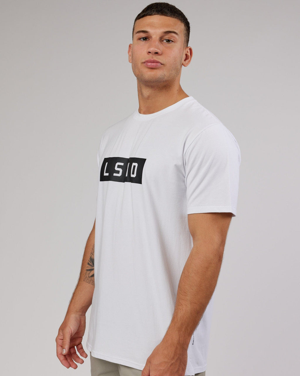 Model wearing Strength FLXCotton Tee - White-Black