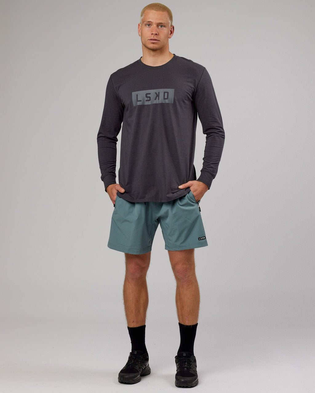 Model wearing Strength FLXDRY Performance LS Tee - Asphalt
